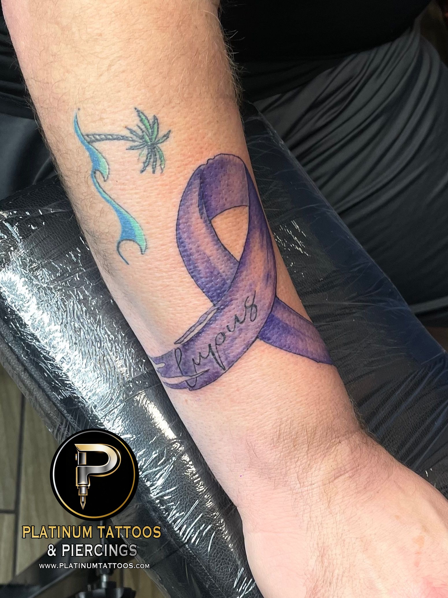 Tattoo on the forearm by Skar at Platinum Tattoos & Piercings, San Antonio TX