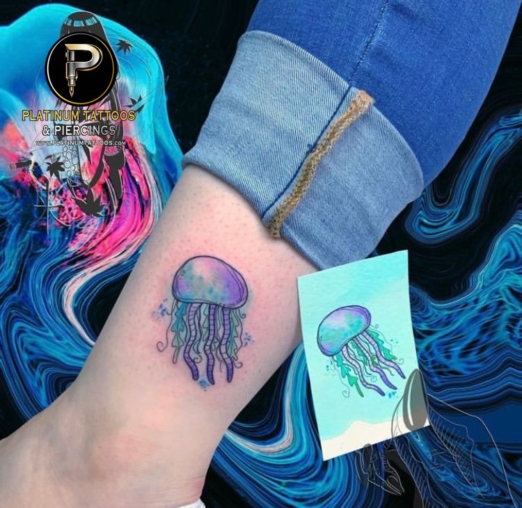 Watercolor tattoo on the ankle at Platinum Tattoos & Piercings, San Antonio TX