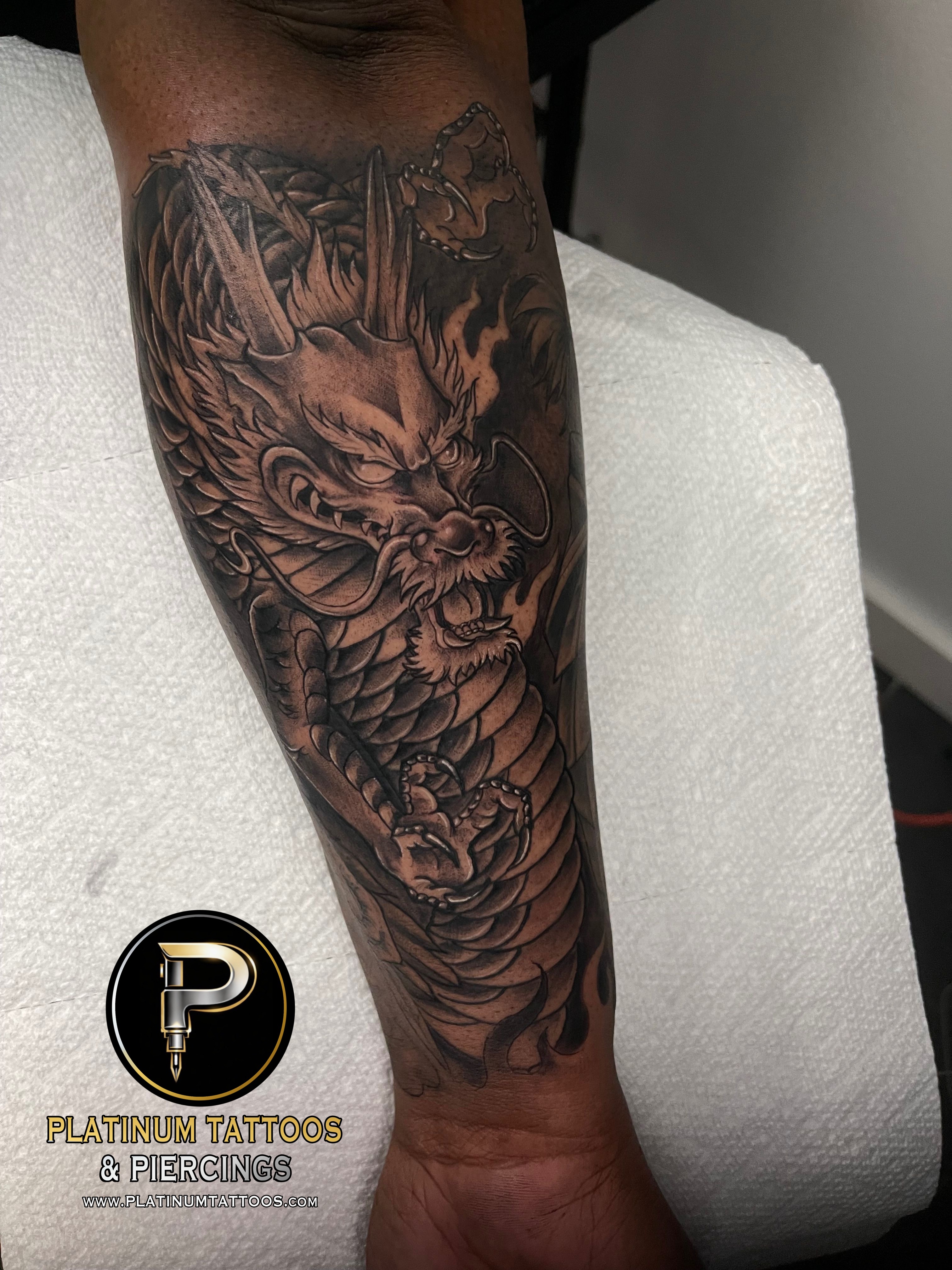 Tattoo on the forearm by Jerson at Platinum Tattoos & Piercings, San Antonio TX