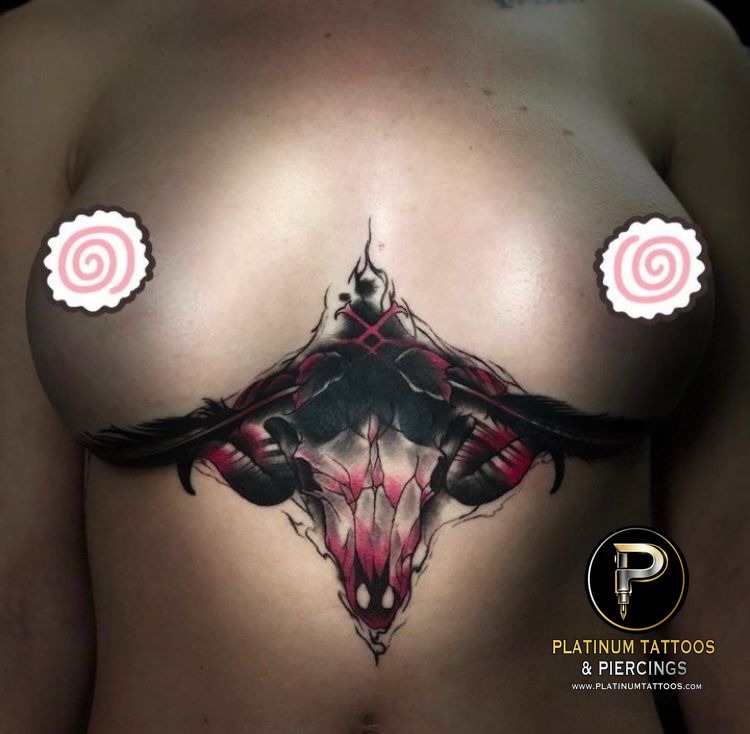 Tattoo on the sternum at Platinum Tattoos & Piercings, San Antonio TX