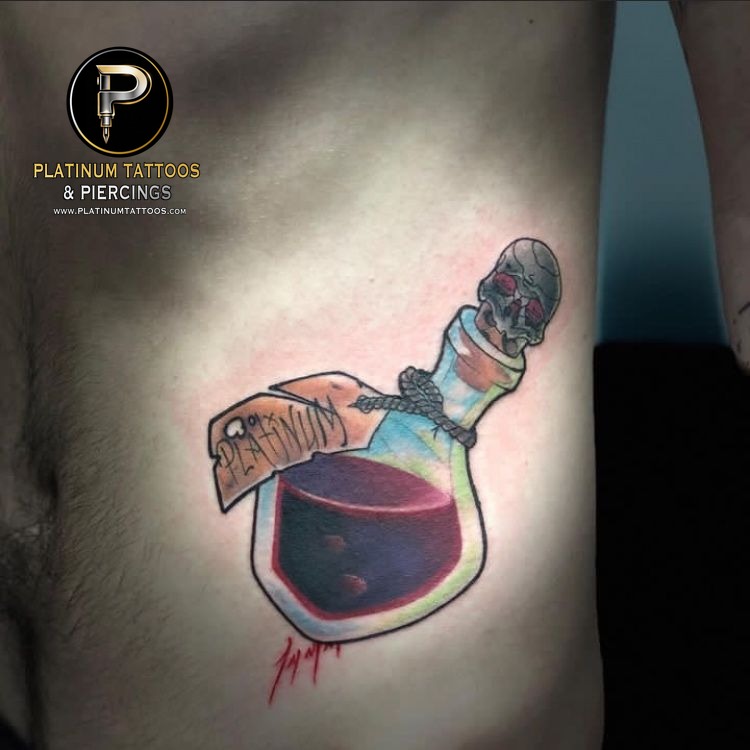 Traditional tattoo on the hip at Platinum Tattoos & Piercings, San Antonio TX