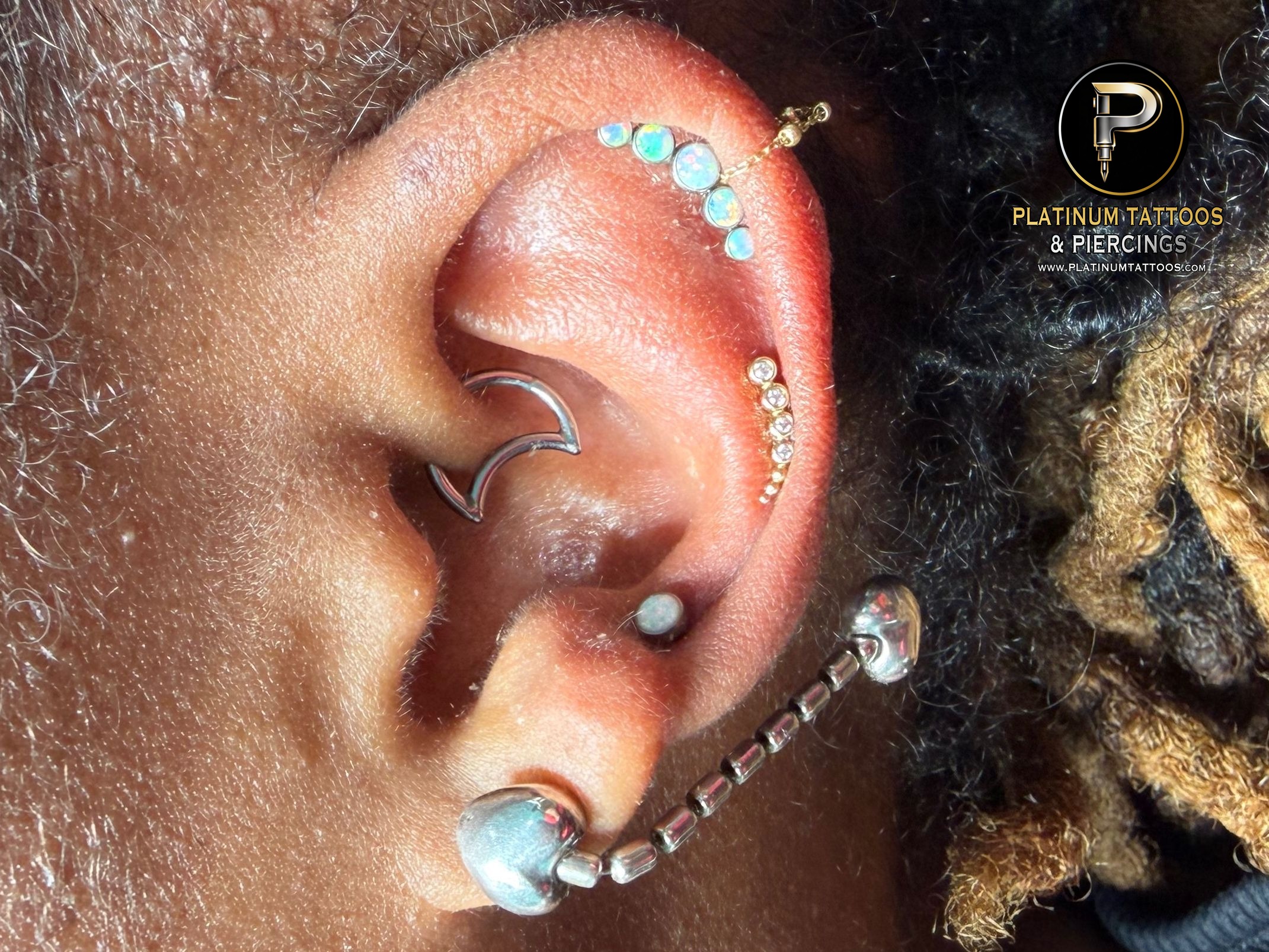 Cluster/Multi-Gem, Cluster/Multi-Gem, Threadless piercing on the Mid Helix, 1st Helix, 3rd Helix by Mingo at Platinum Tattoos & Piercings, San Antonio TX
