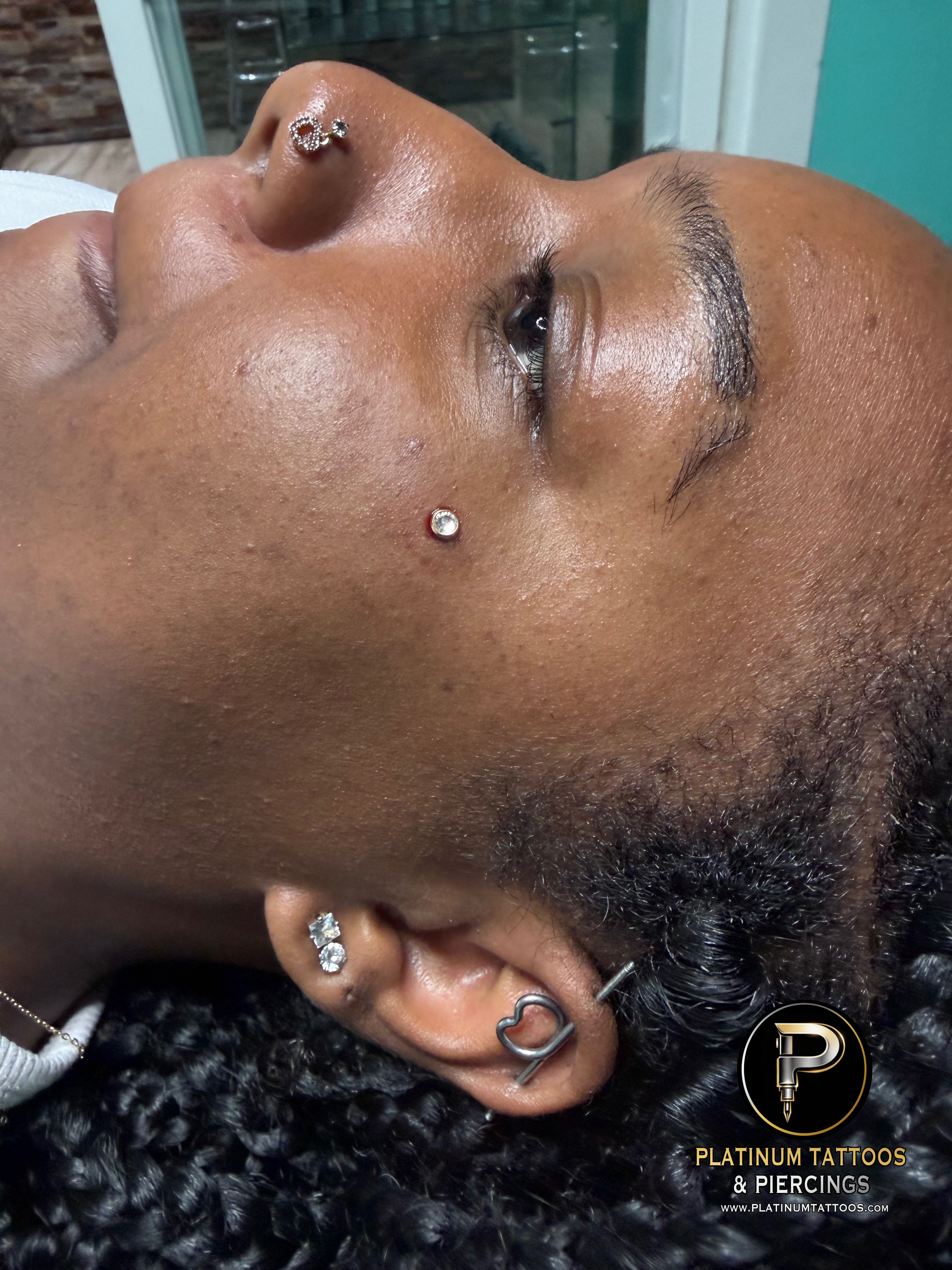 Surface Jewelry piercing on the Dermal by Mingo at Platinum Tattoos & Piercings, San Antonio TX