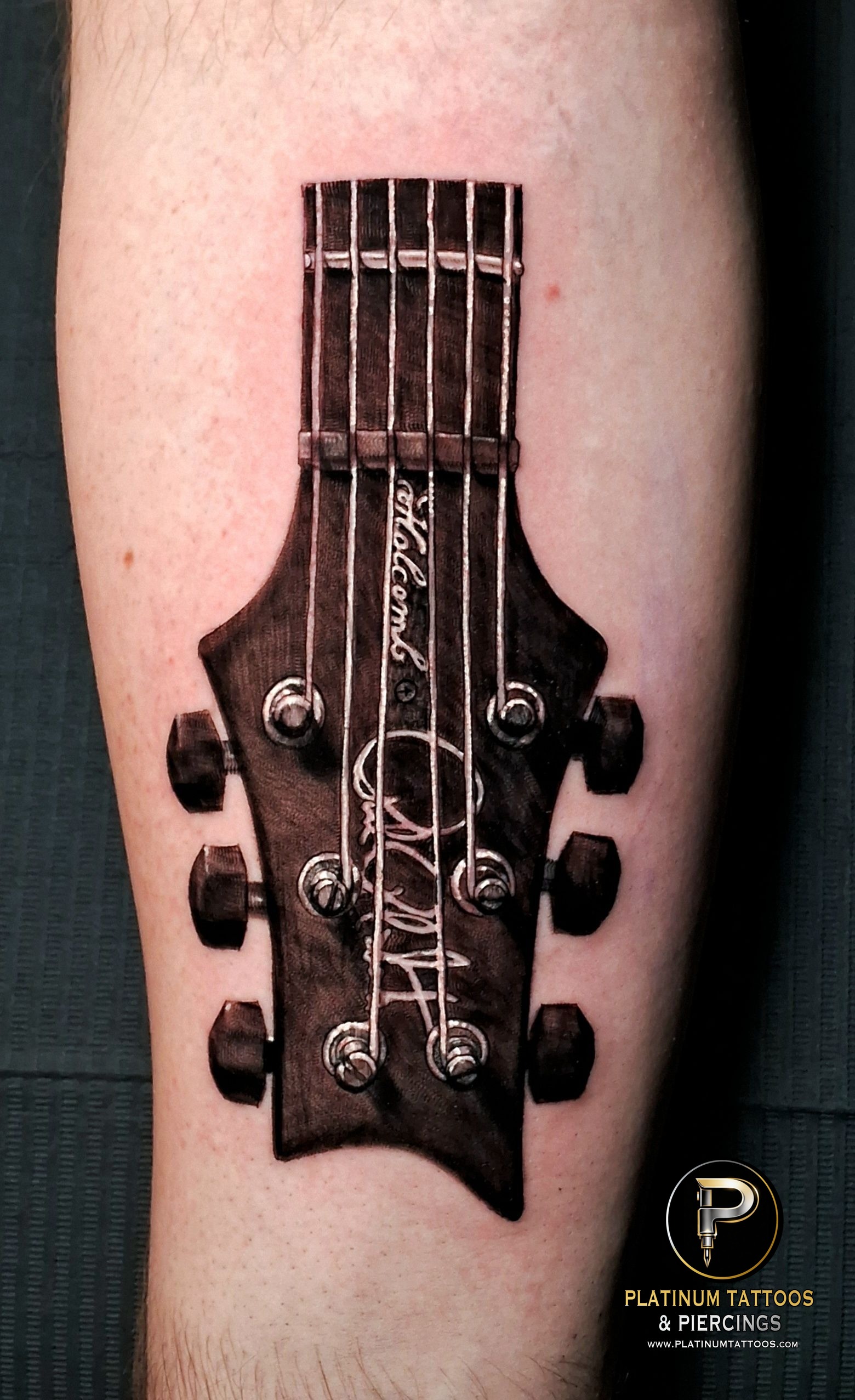 Black & Grey tattoo on the Upper Arm by Lee at Platinum Tattoos & Piercings, San Antonio TX