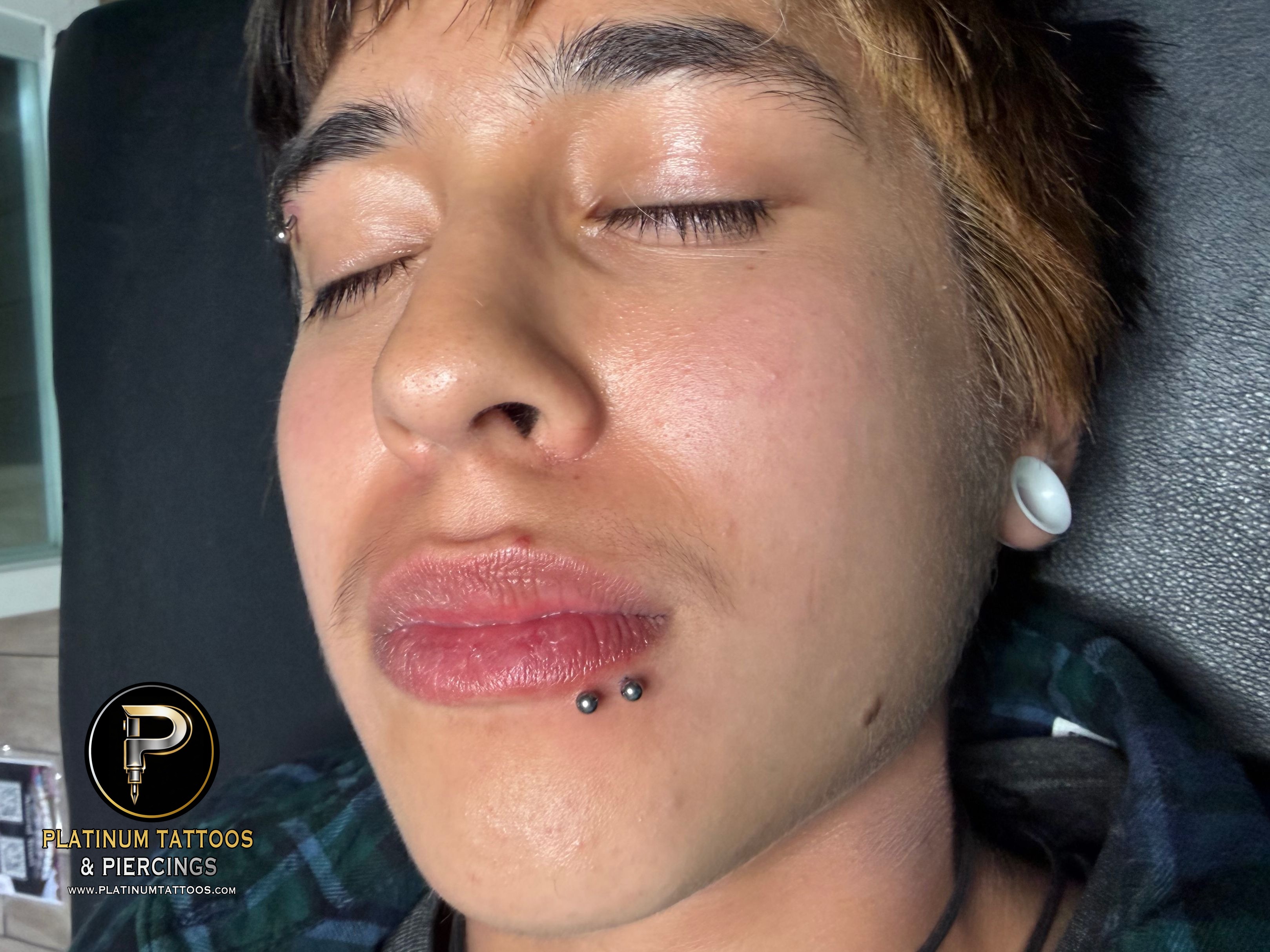 Spider Bites piercing with Implant Grade Titanium Labret Stud/Flat Back by NeoMetal by Mingo at Platinum Tattoos & Piercings, San Antonio TX