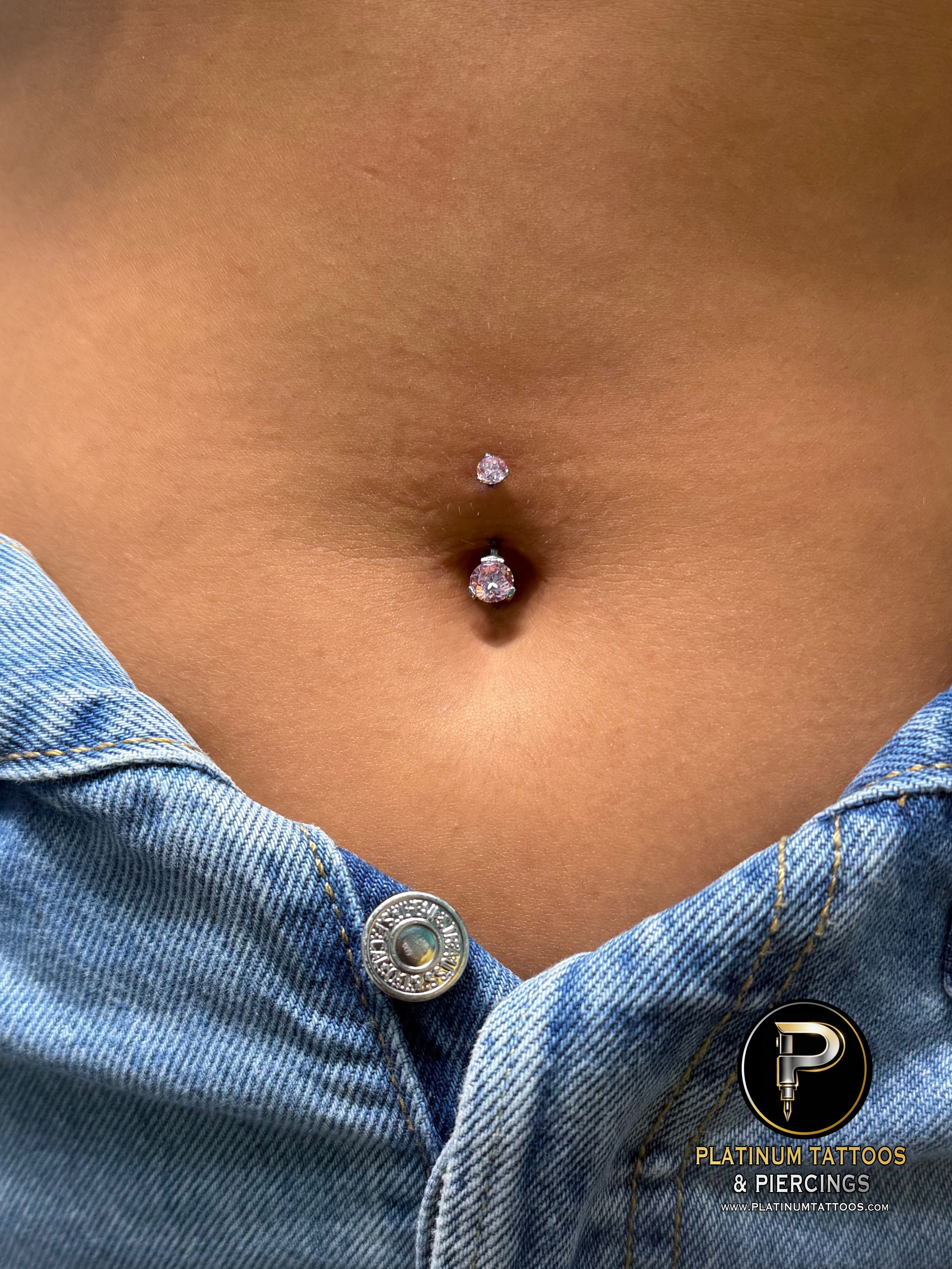 Belly Button piercing with Implant Grade Titanium Curved Barbell by Industrial Strength by Mingo at Platinum Tattoos & Piercings, San Antonio TX