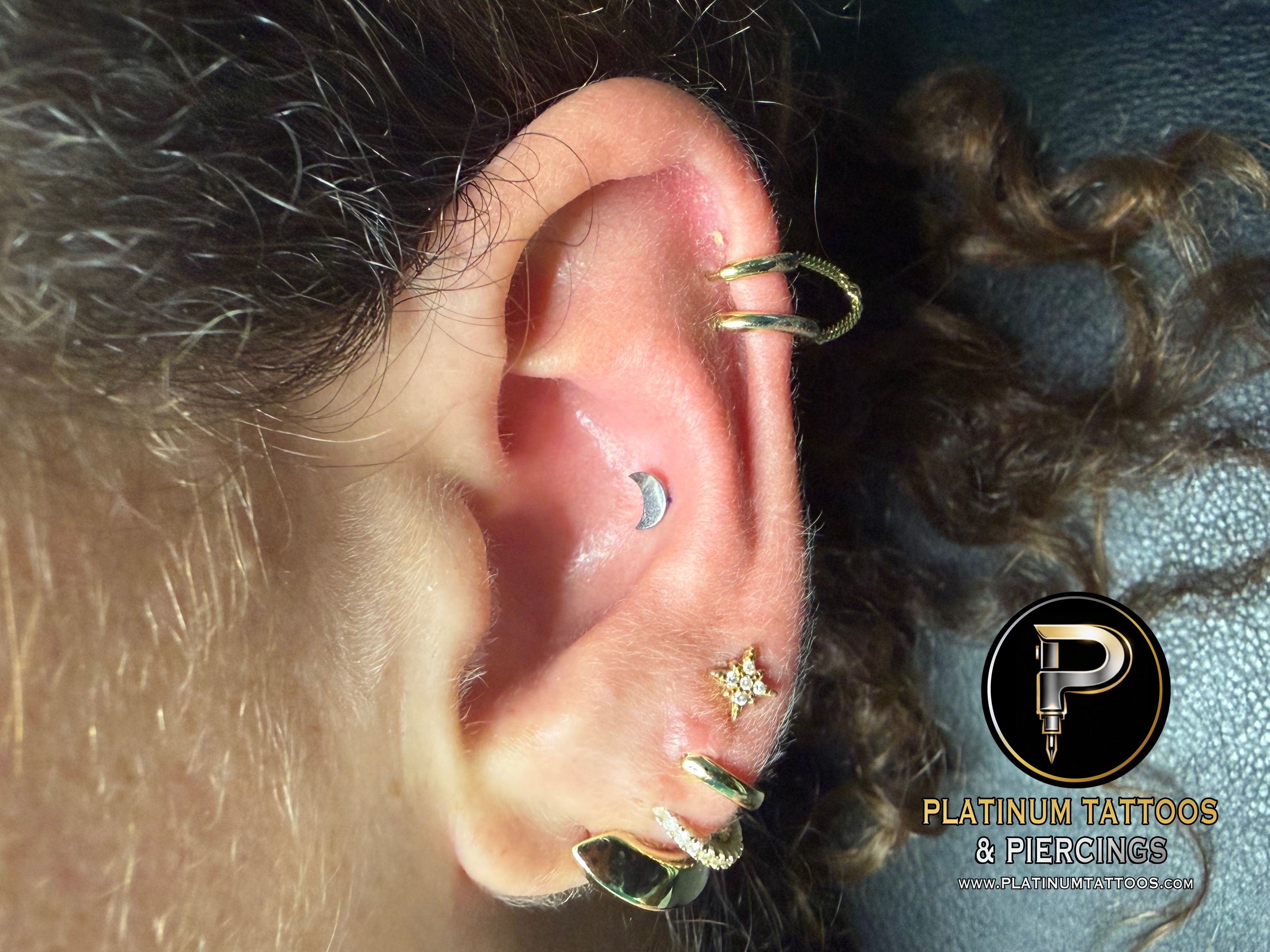 Conch piercing with Implant Grade Titanium Labret Stud/Flat Back by NeoMetal by Mingo at Platinum Tattoos & Piercings, San Antonio TX