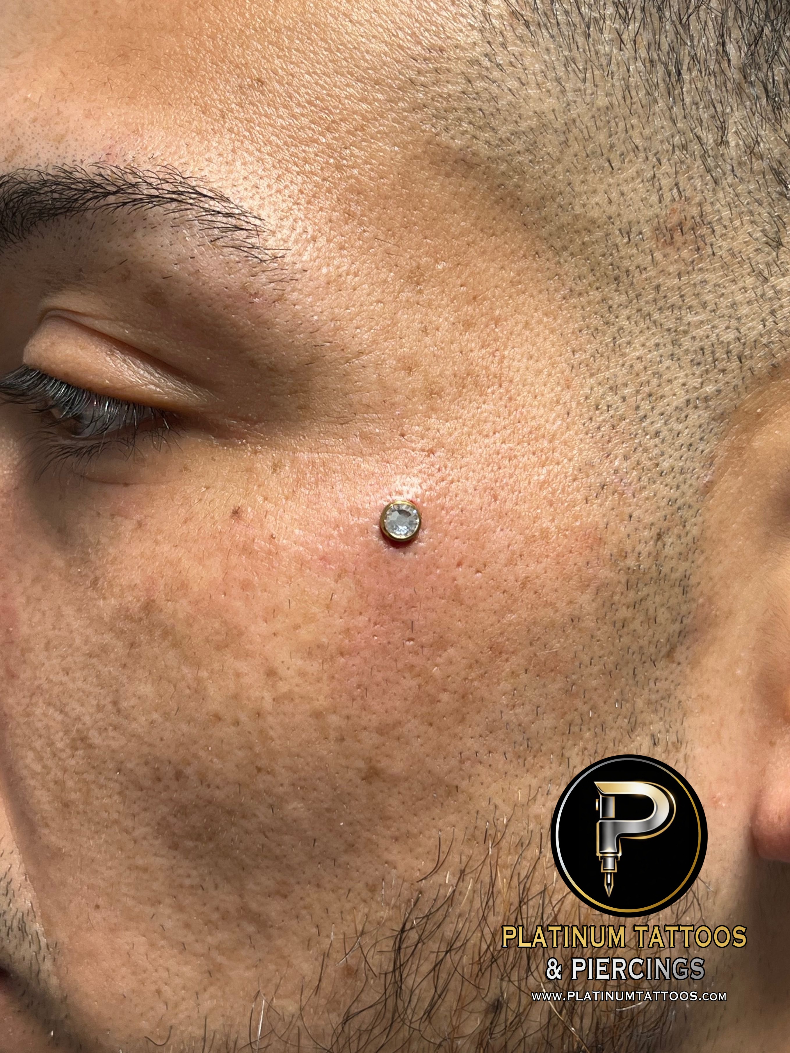 Dermal piercing with Implant Grade Titanium Surface Jewelry by Other by Harley at Platinum Tattoos & Piercings, San Antonio TX