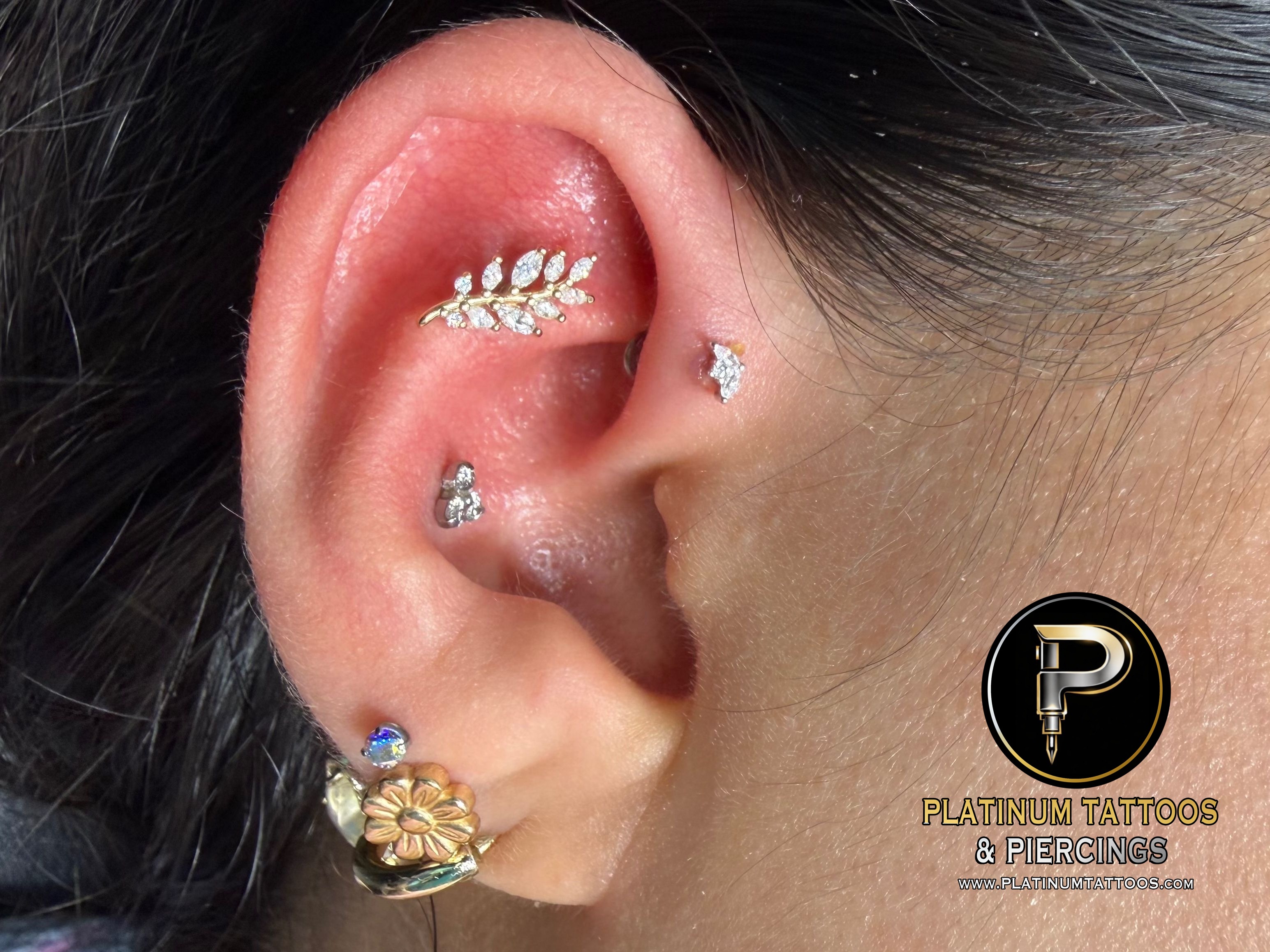 Curated ear piercing setup β 1st Forward Helix, Flat with 14k White Gold, 14k Yellow Gold Cluster/Multi-Gem by Buddha Jewelry by Mingo at Platinum Tattoos & Piercings, San Antonio TX