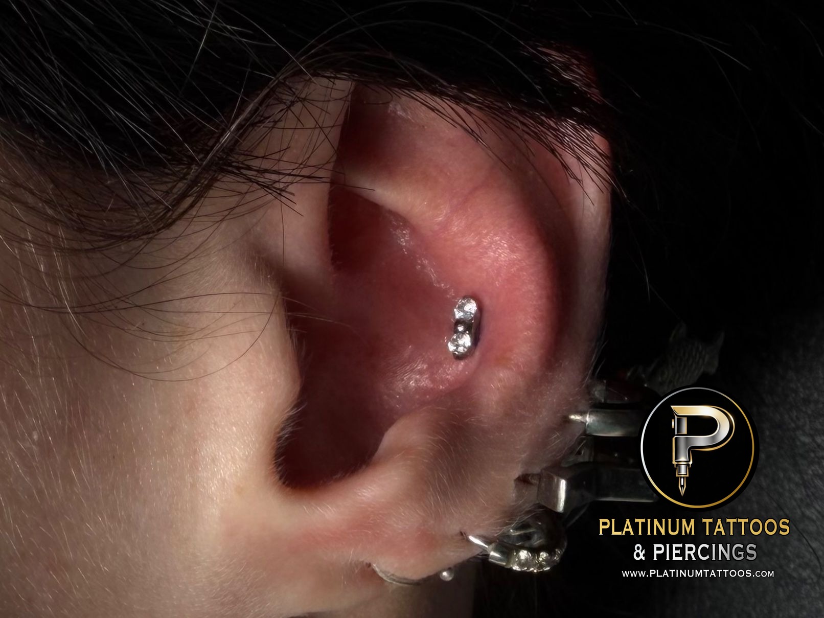 Conch piercing with Implant Grade Titanium Cluster/Multi-Gem by Other by Mingo at Platinum Tattoos & Piercings, San Antonio TX