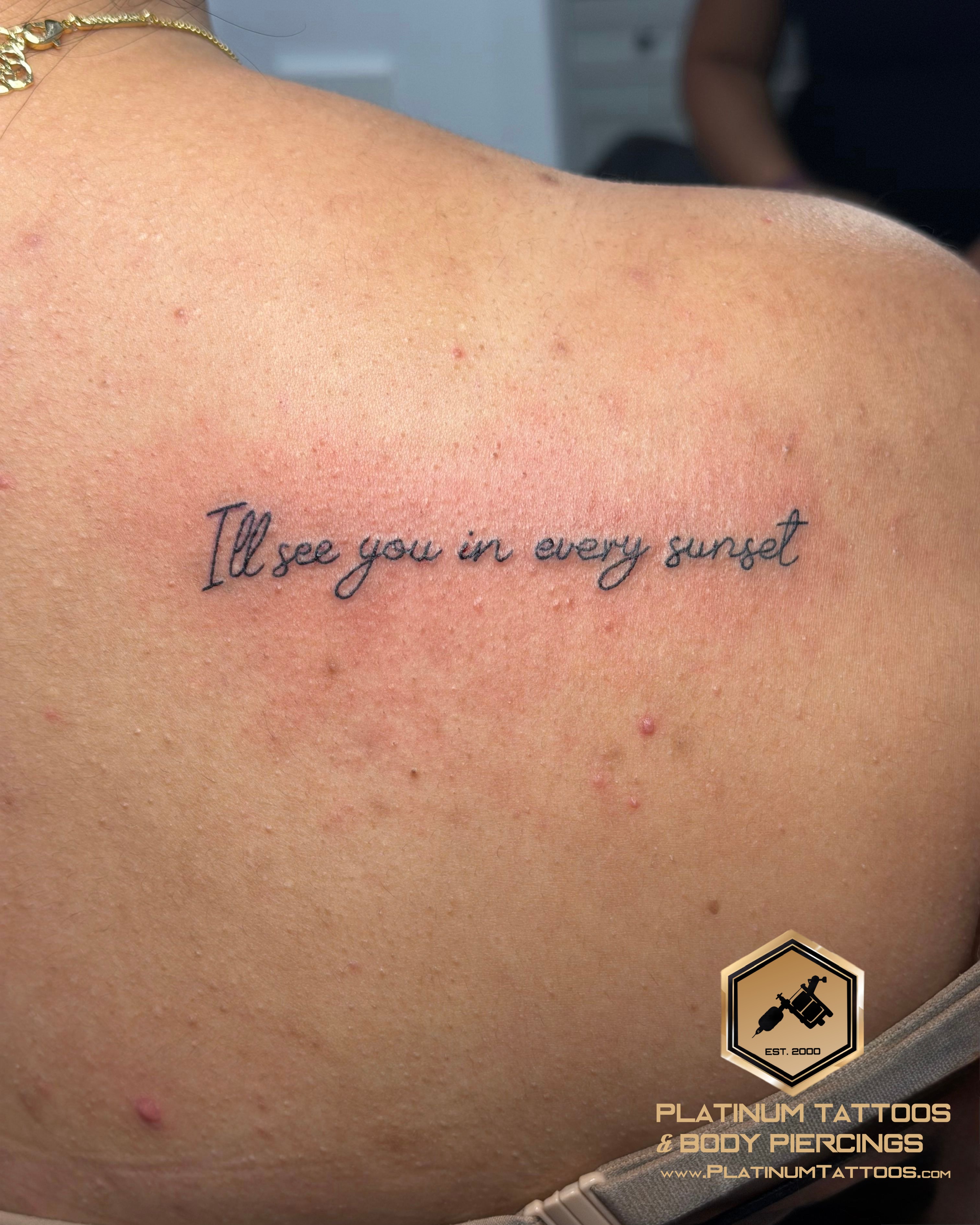 Lettering tattoo on the back by Jerson at Platinum Tattoos & Piercings, San Antonio TX