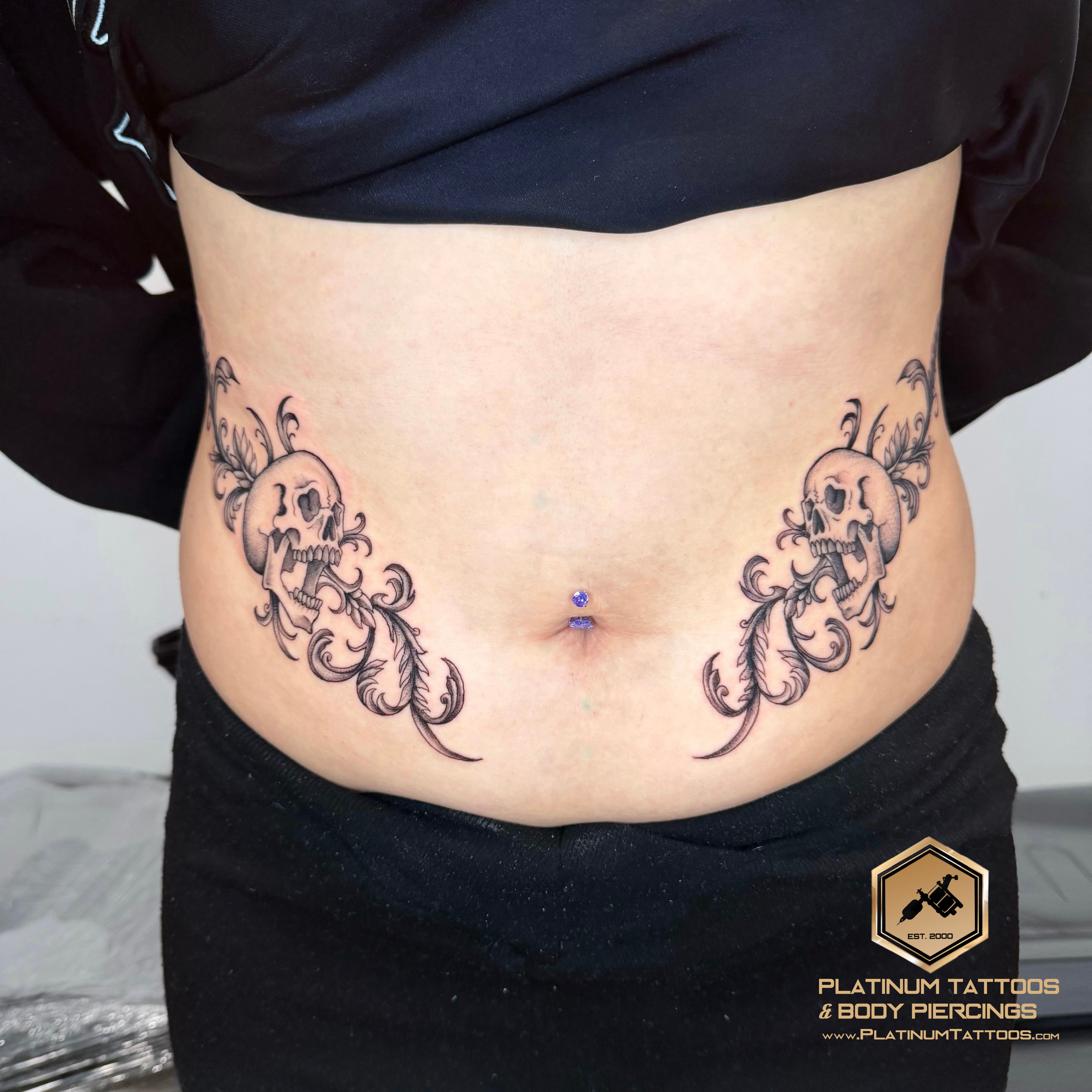 Blackwork tattoo on the stomach by Jerson at Platinum Tattoos & Piercings, San Antonio TX