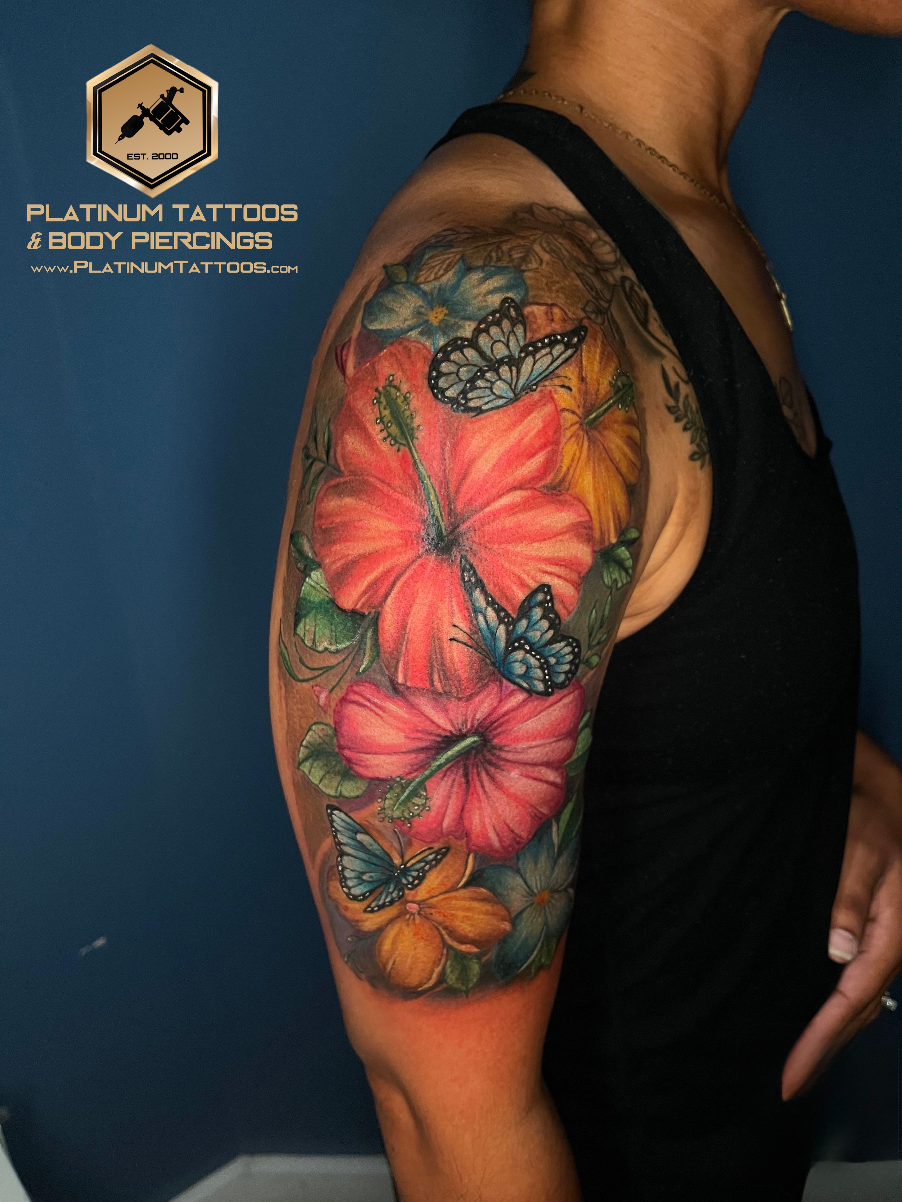 Floral tattoo by Jerson at Platinum Tattoos & Piercings, San Antonio TX