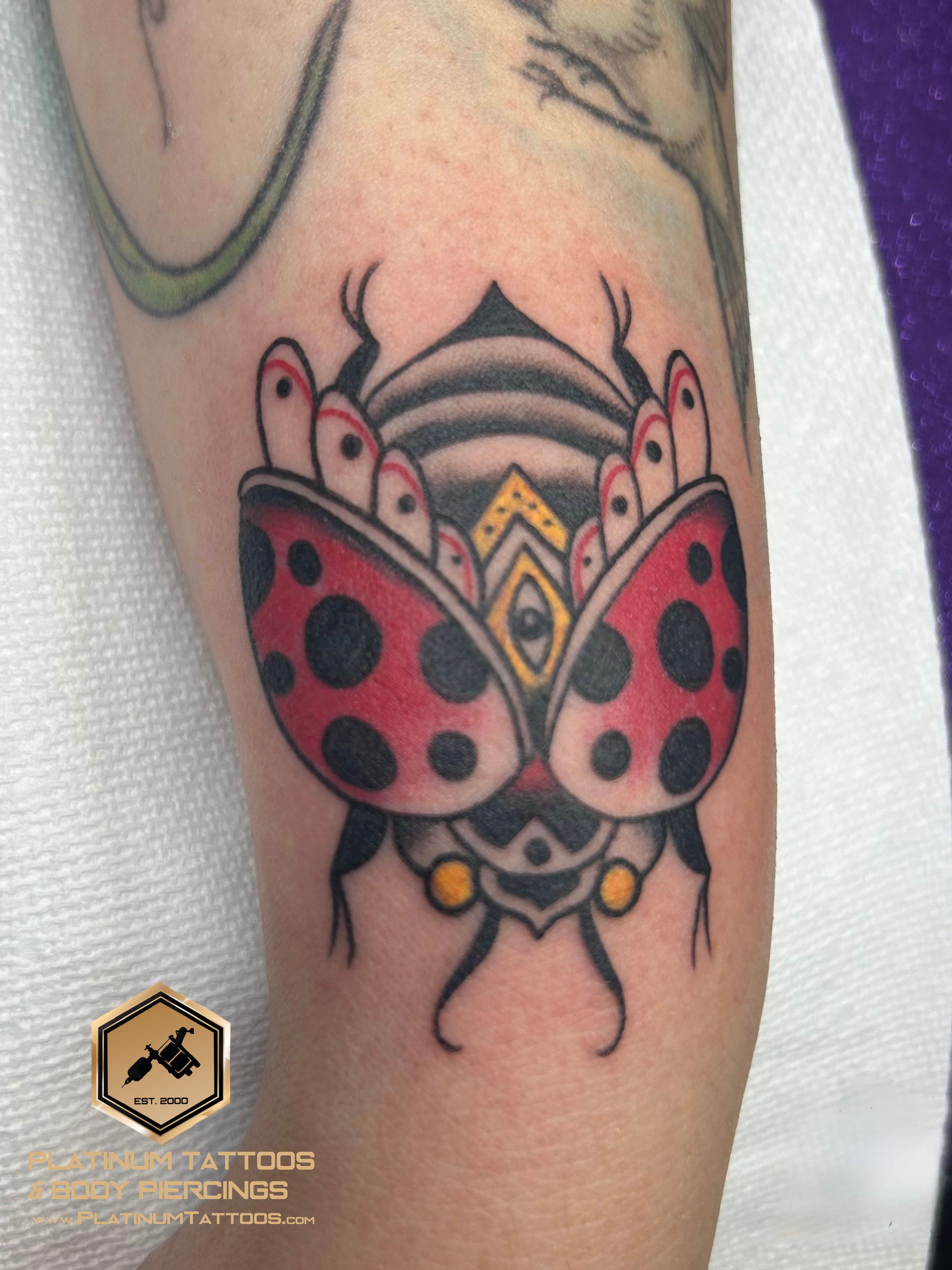 Traditional tattoo on the wrist by JR at Platinum Tattoos & Piercings, San Antonio TX