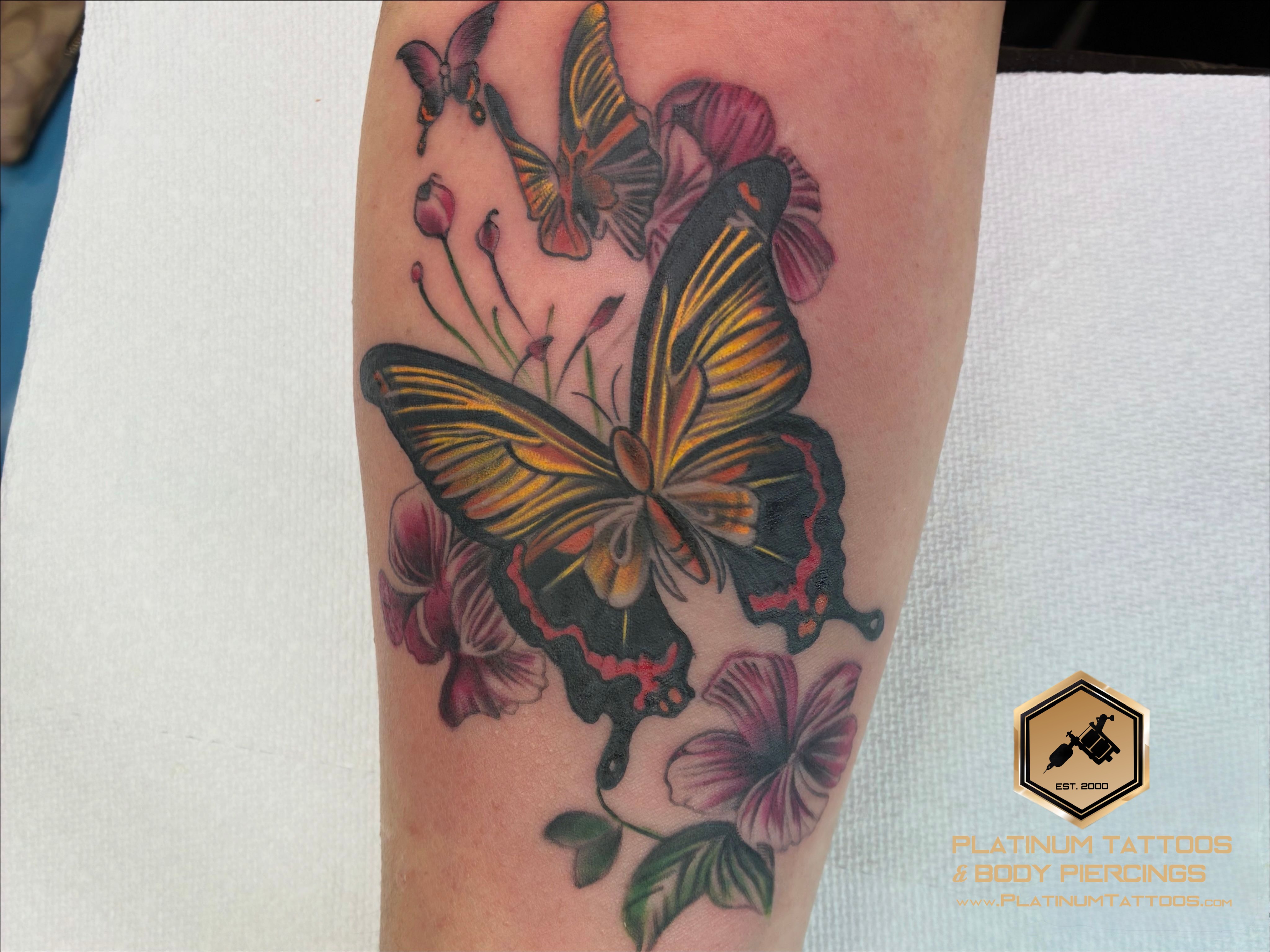 Floral tattoo on the forearm by JR at Platinum Tattoos & Piercings, San Antonio TX