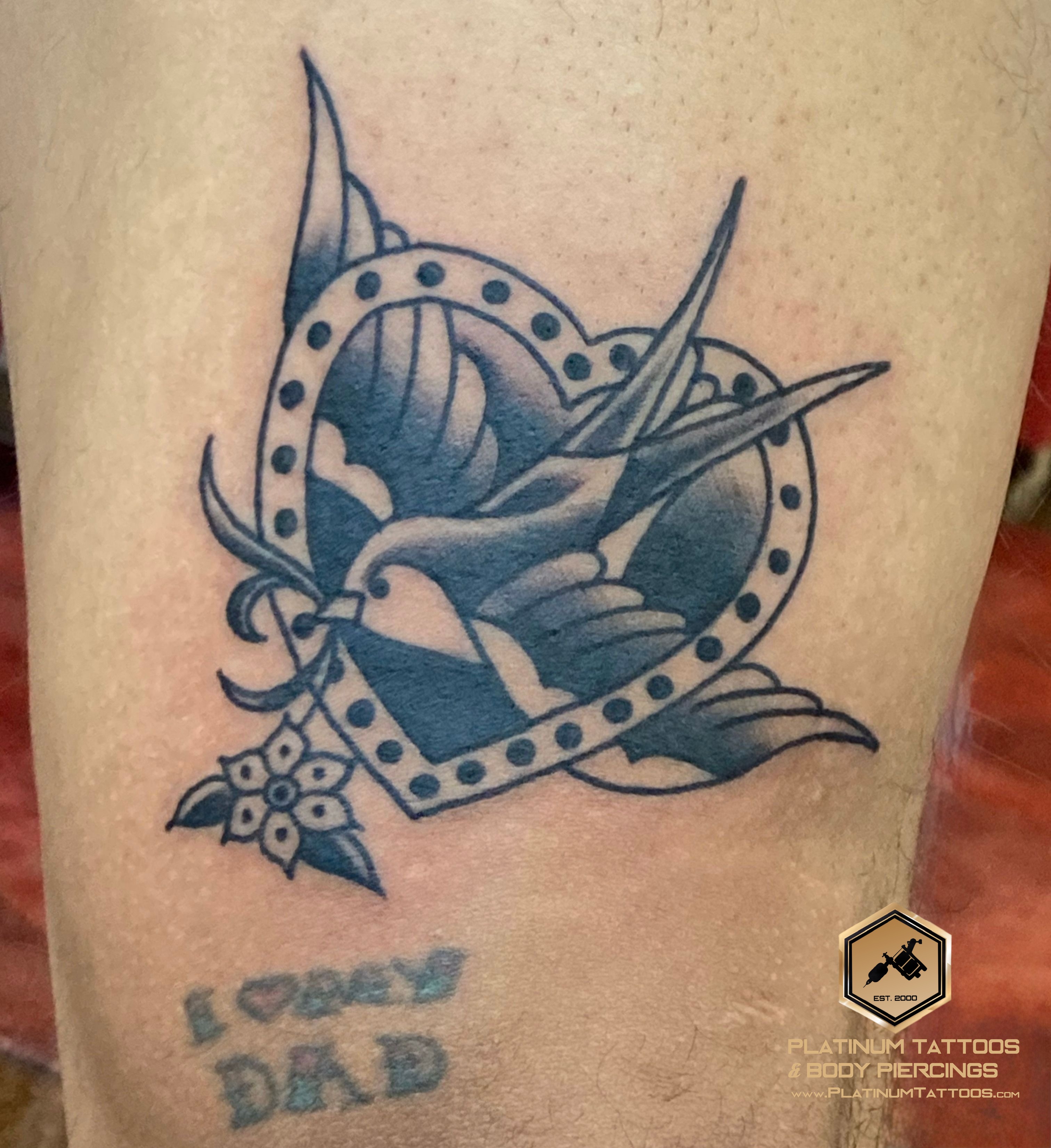 Traditional tattoo on the thigh by JR at Platinum Tattoos & Piercings, San Antonio TX