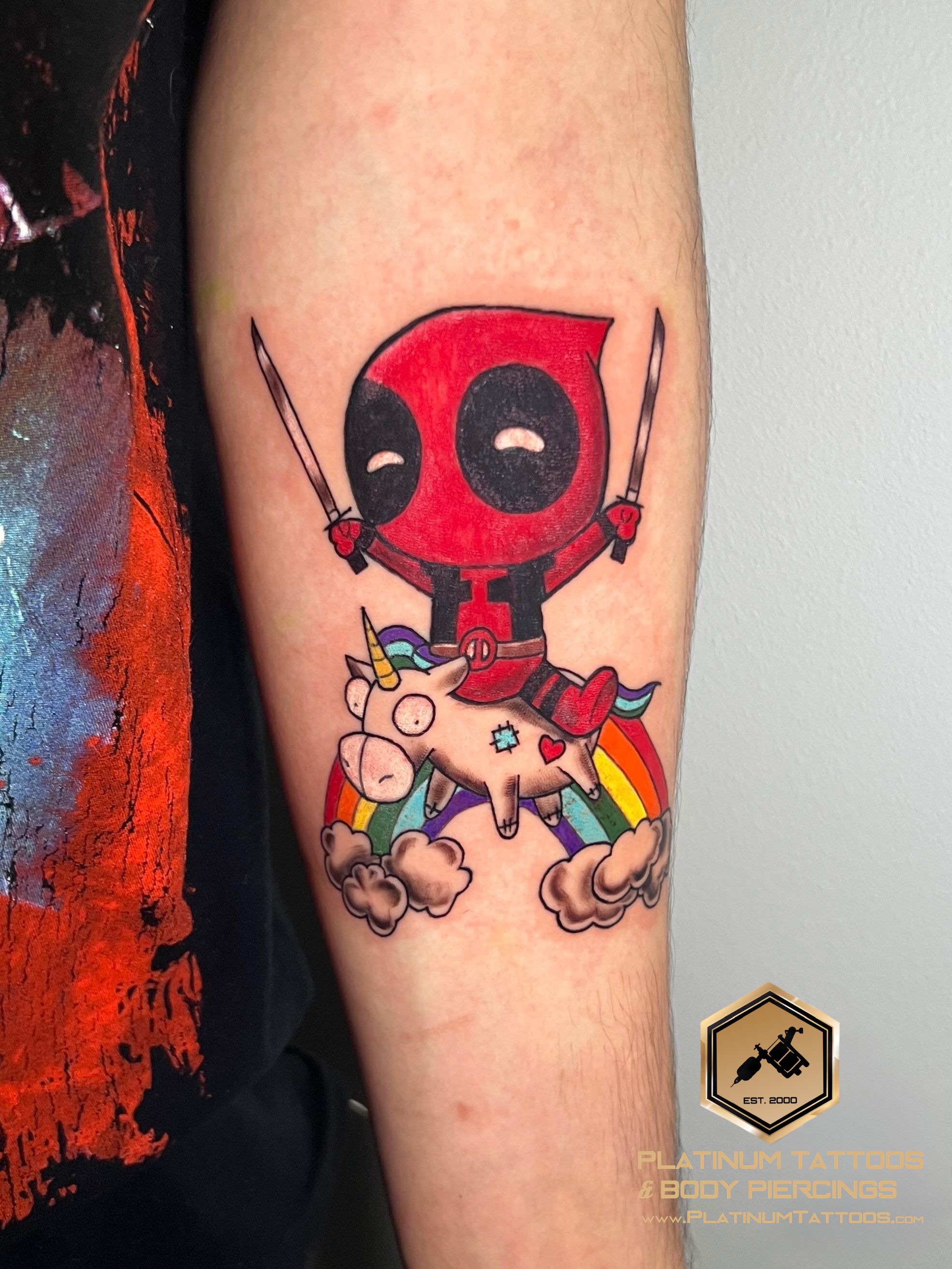 Anime tattoo on the forearm by Jesus at Platinum Tattoos & Piercings, San Antonio TX