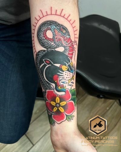 Traditional tattoo on the forearm by Jesus at Platinum Tattoos & Piercings, San Antonio TX