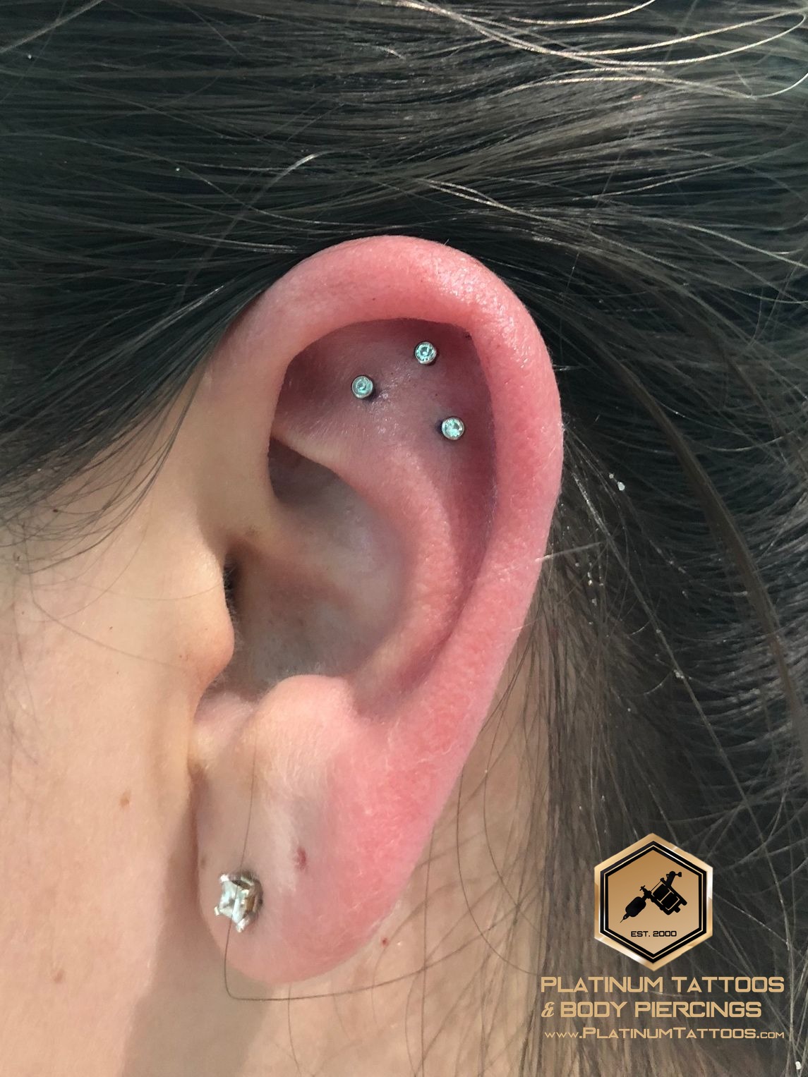 piercing 3rd Helix on the Right Ear by Mingo at Platinum Tattoos & Piercings, San Antonio TX