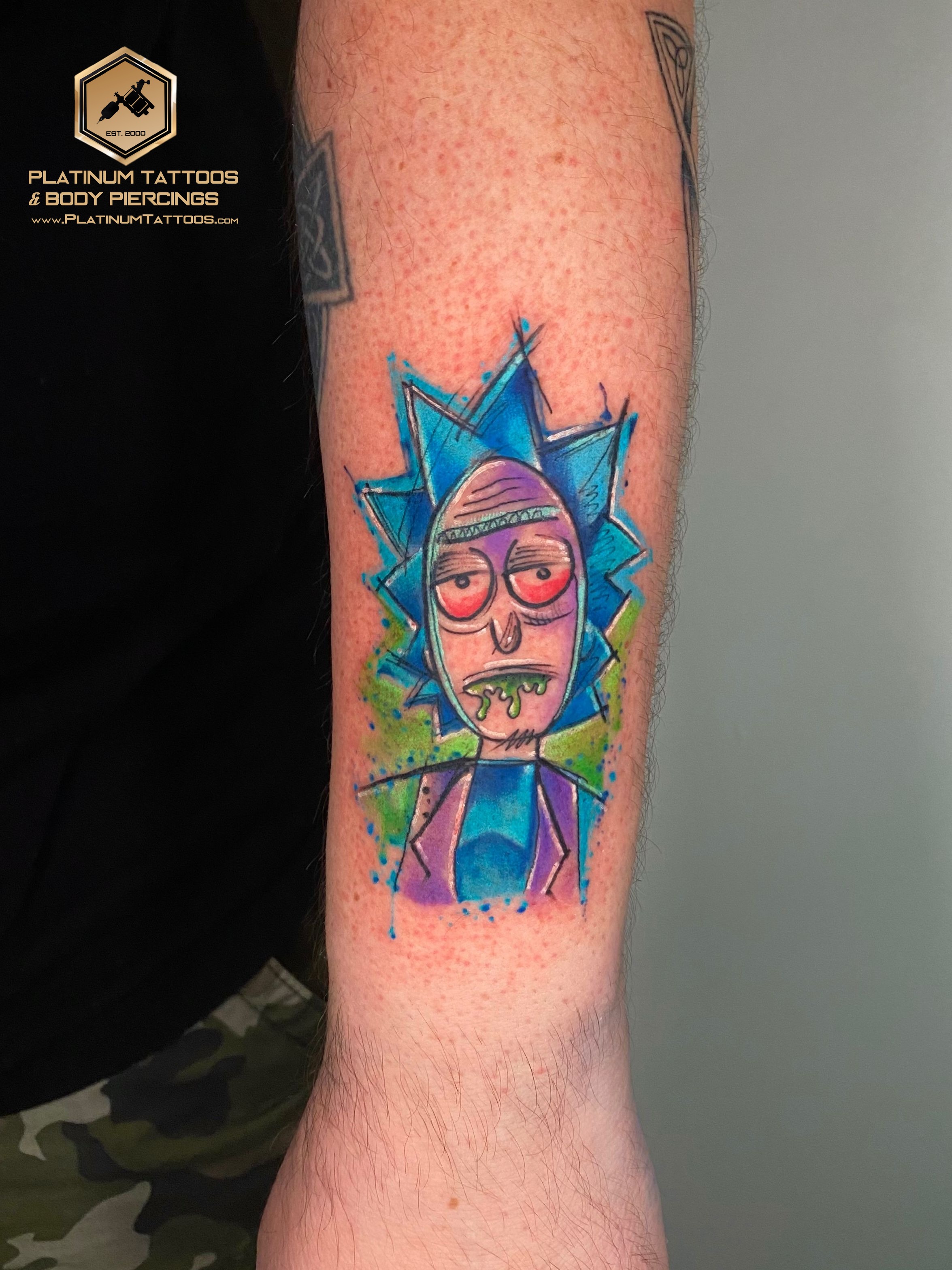 Anime tattoo on the forearm by Remy at Platinum Tattoos & Piercings, San Antonio TX
