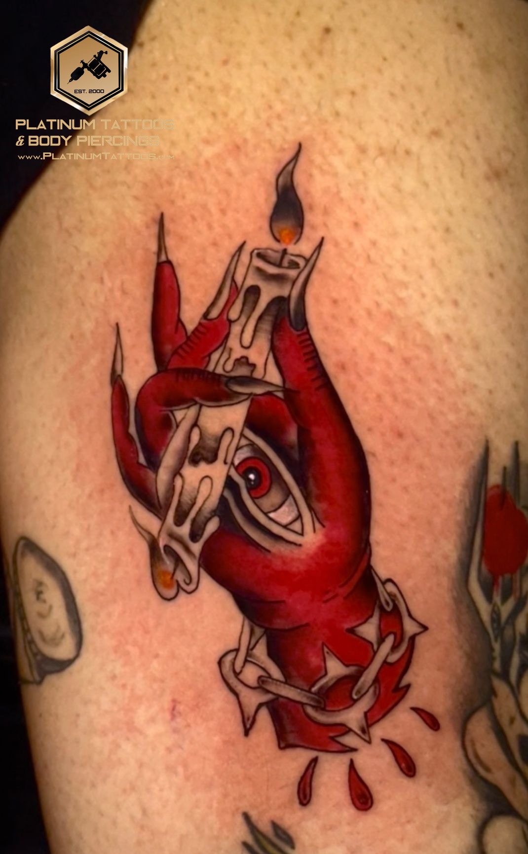 Traditional tattoo on the thigh by Skar at Platinum Tattoos & Piercings, San Antonio TX