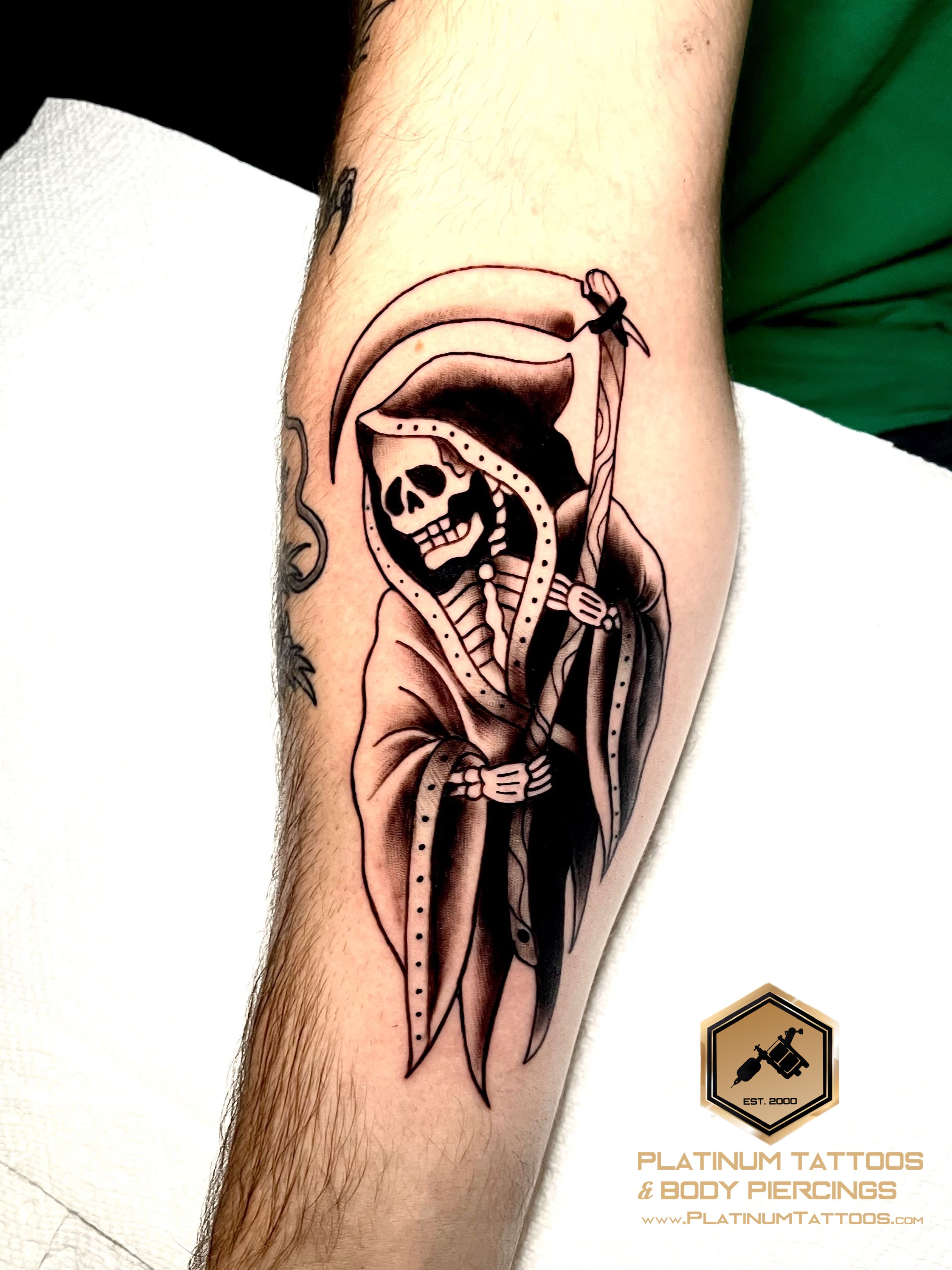 Traditional tattoo on the forearm by Skar at Platinum Tattoos & Piercings, San Antonio TX