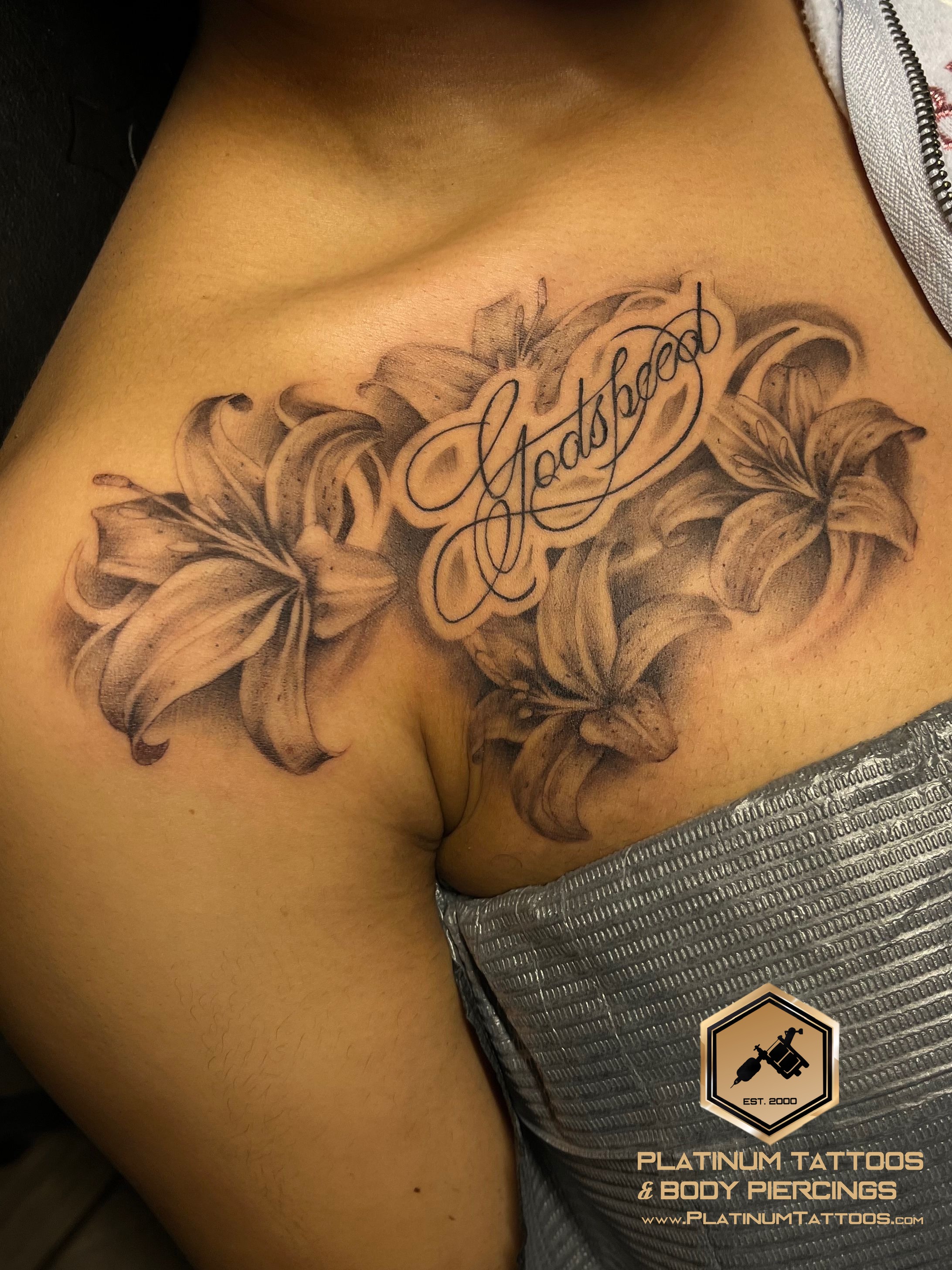 Floral tattoo on the chest at Platinum Tattoos & Piercings, San Antonio TX