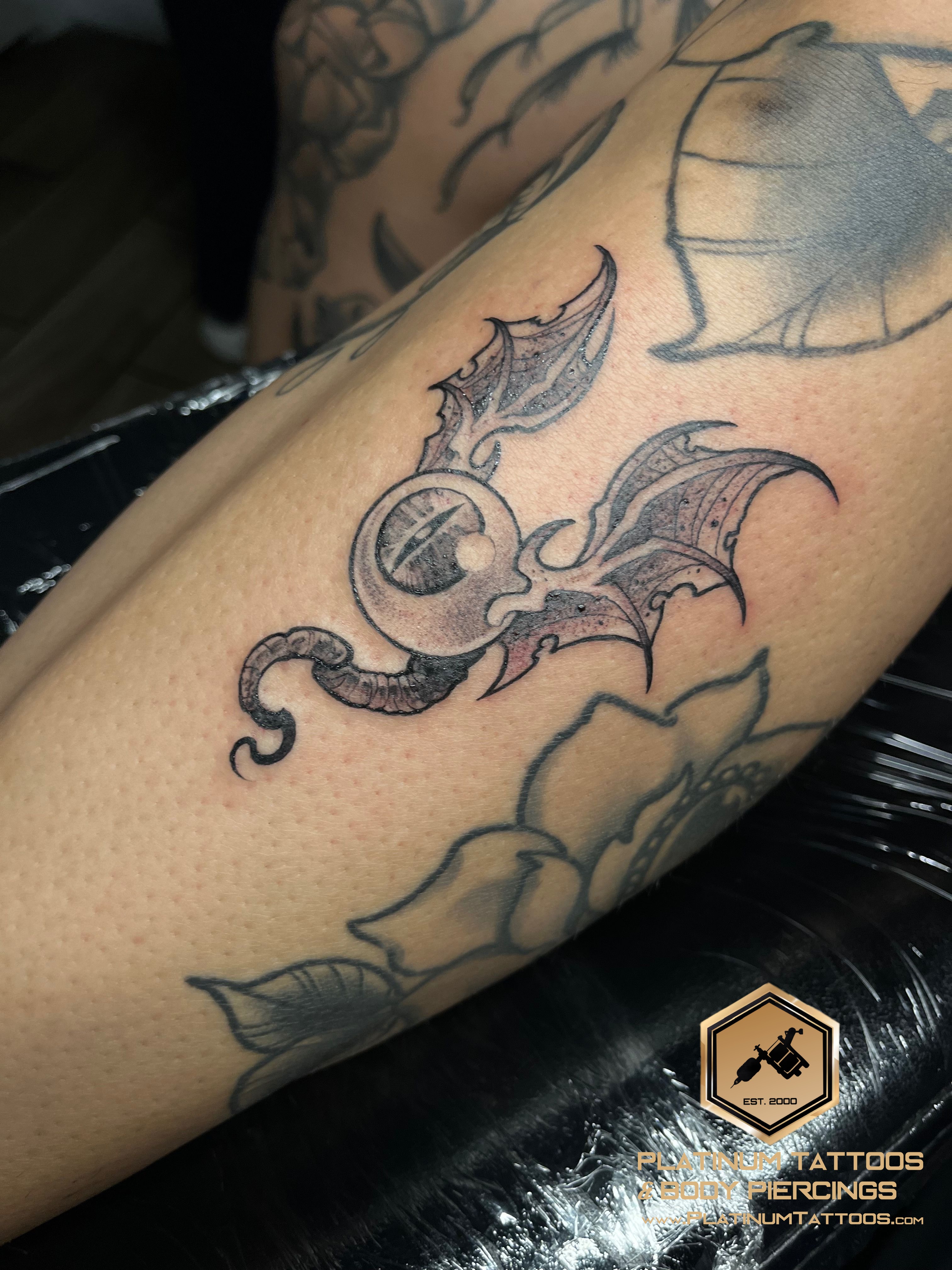Tattoo on the shin at Platinum Tattoos & Piercings, San Antonio TX