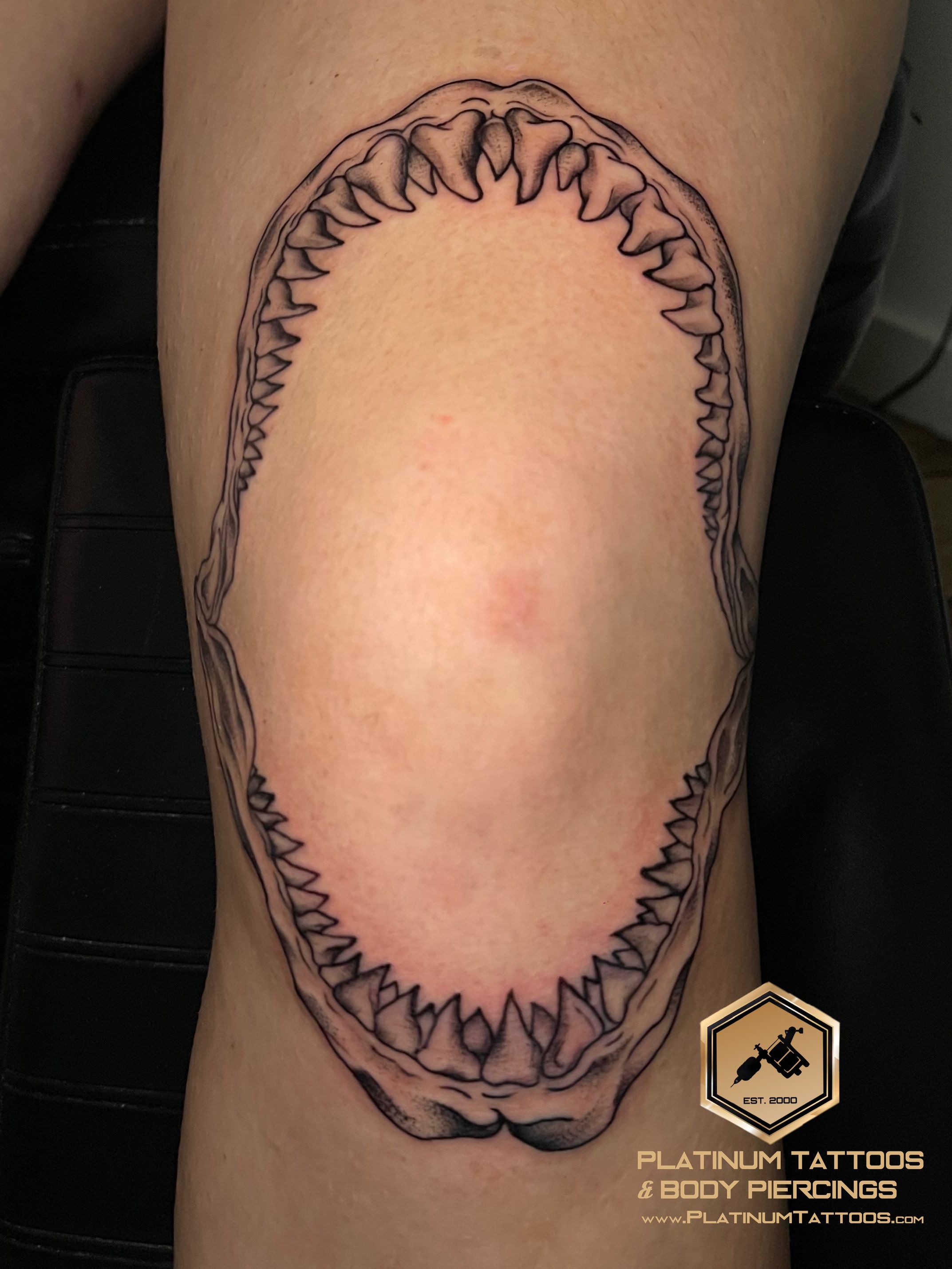 Tattoo on the knee by Skar at Platinum Tattoos & Piercings, San Antonio TX