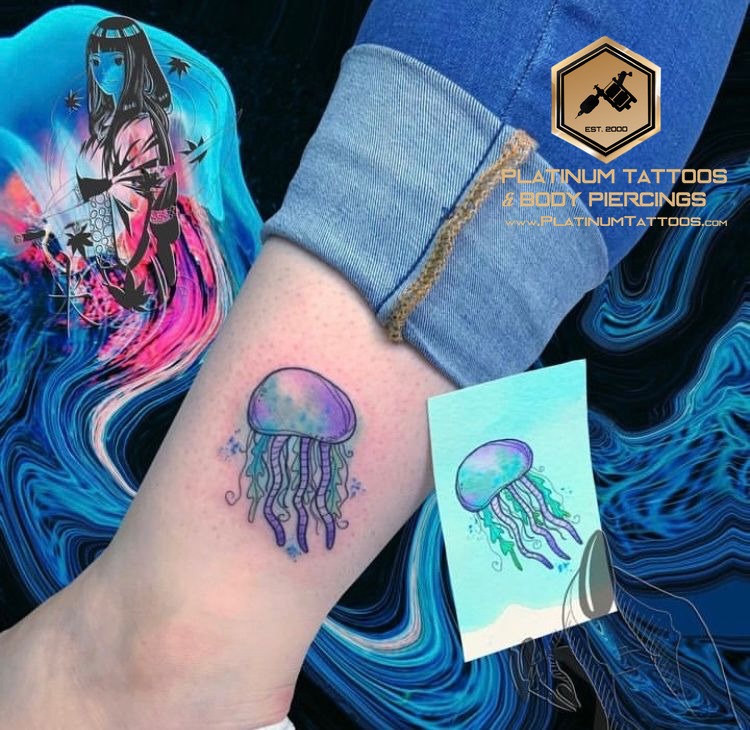 Watercolor tattoo on the ankle at Platinum Tattoos & Piercings, San Antonio TX