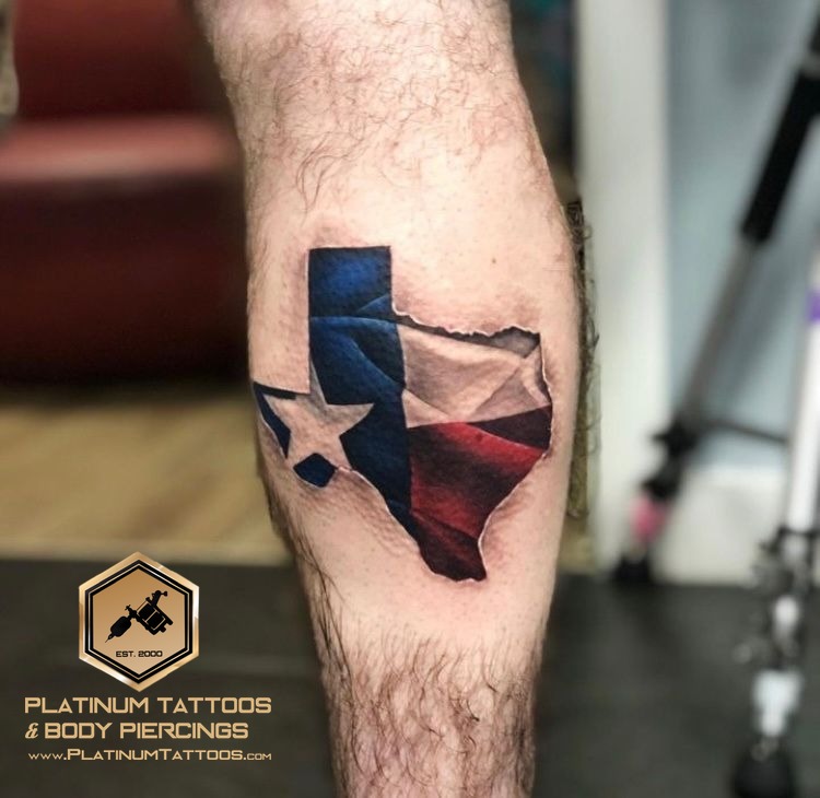 Realism tattoo on the calf at Platinum Tattoos & Piercings, San Antonio TX