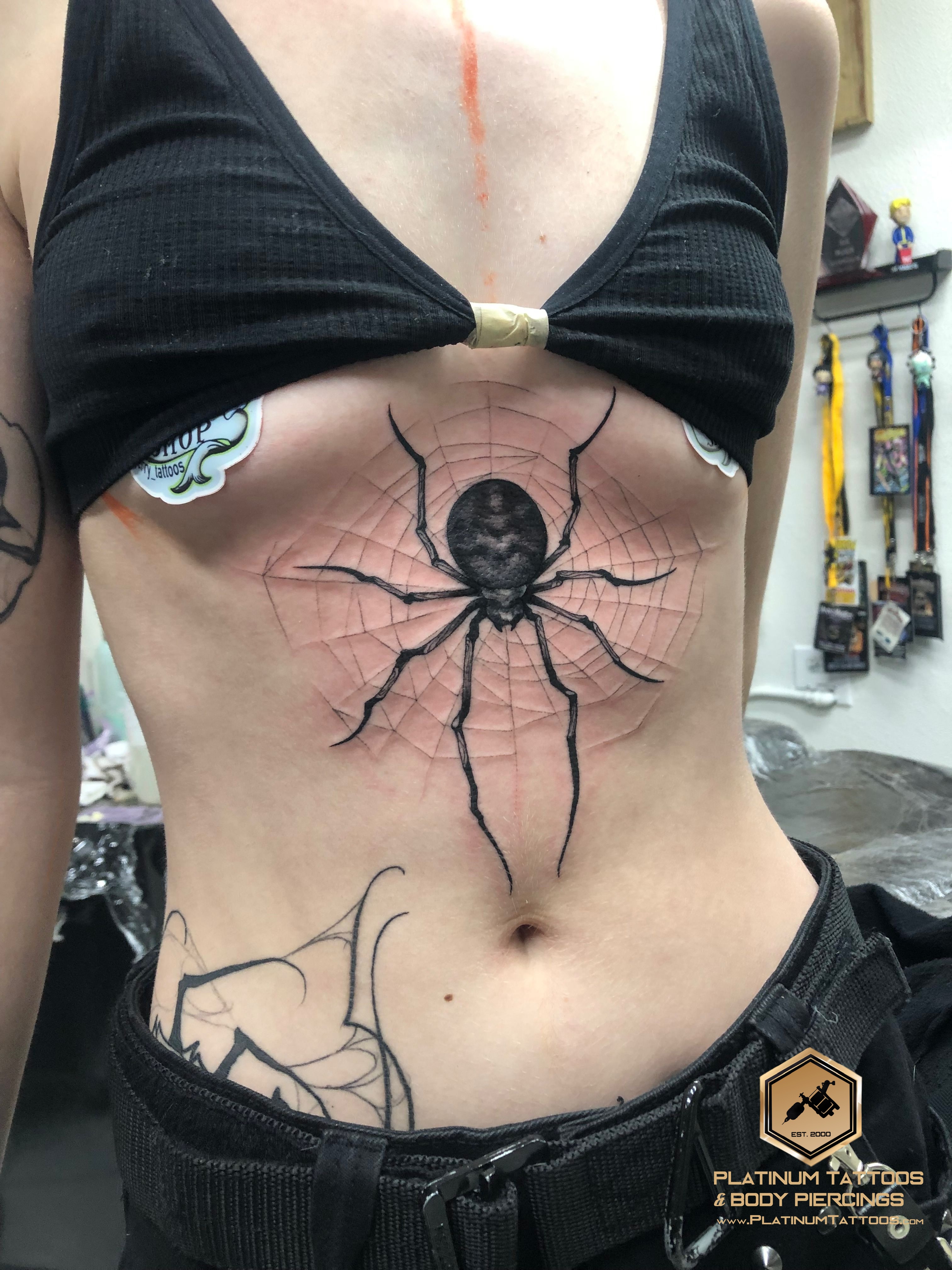 Blackwork tattoo on the sternum at Platinum Tattoos & Piercings, San Antonio TX