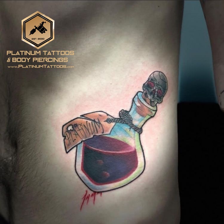 Traditional tattoo on the hip at Platinum Tattoos & Piercings, San Antonio TX
