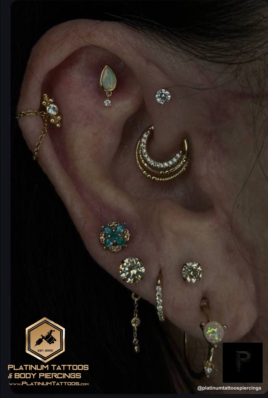 Curated ear piercing on the ear by Noah at Platinum Tattoos & Piercings, San Antonio TX