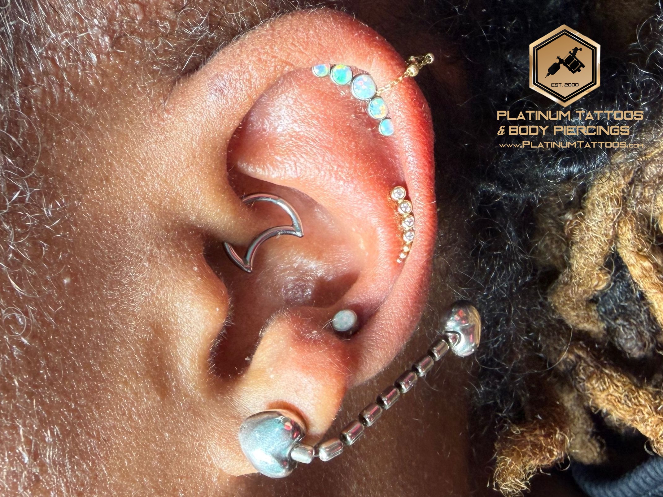 Cluster/Multi-Gem, Cluster/Multi-Gem, Threadless piercing on the Mid Helix, 1st Helix, 3rd Helix by Mingo at Platinum Tattoos & Piercings, San Antonio TX