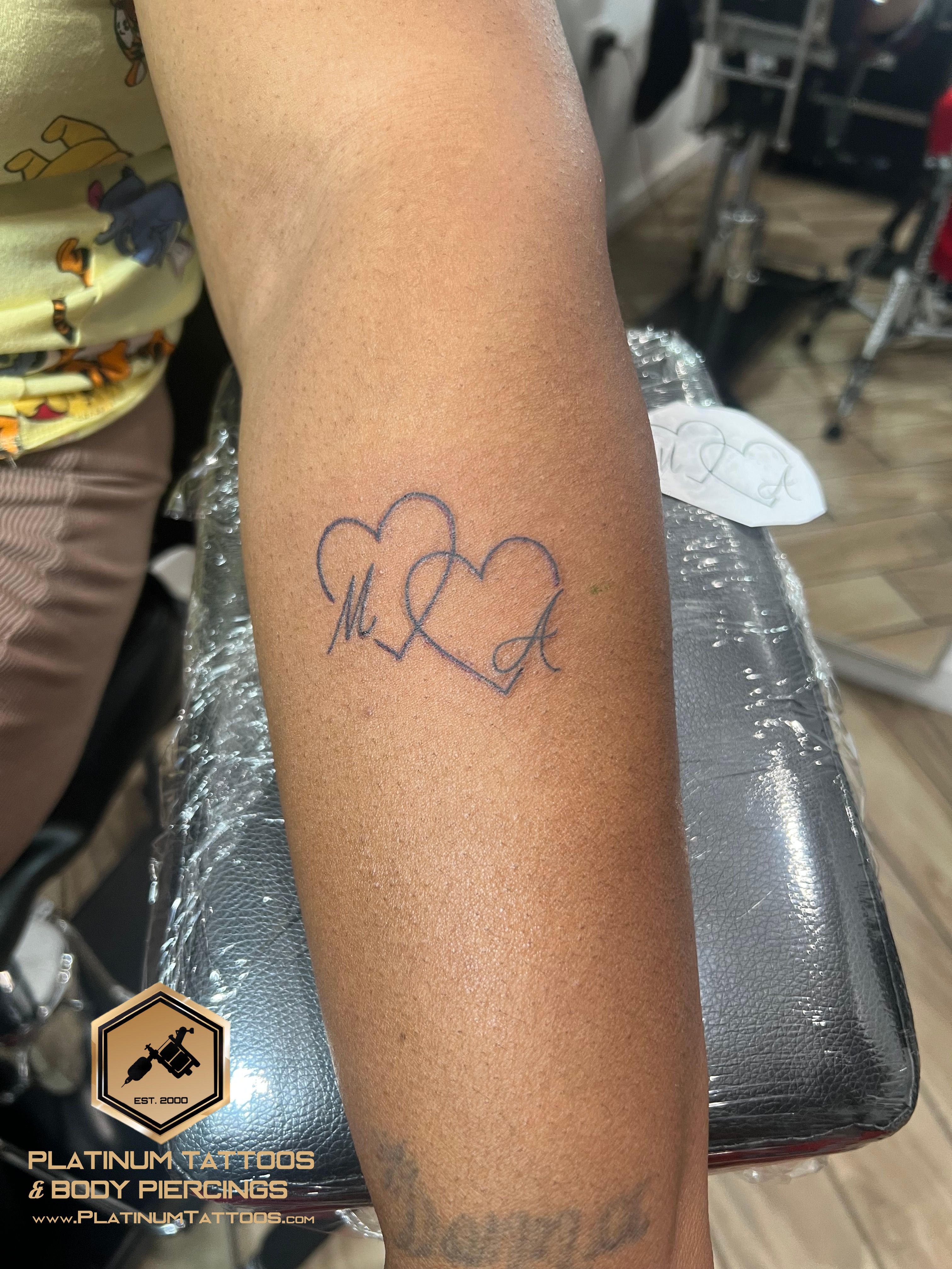Minimalist tattoo on the forearm by Jesus at Platinum Tattoos Piercings, San Antonio TX