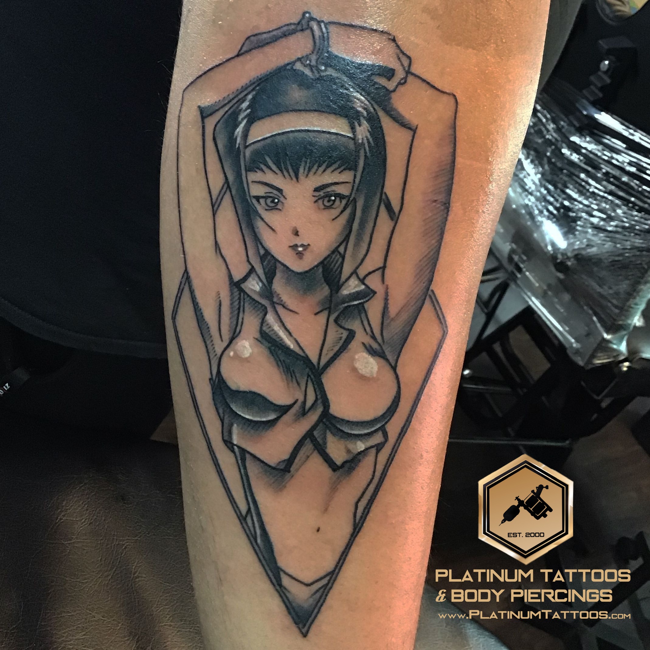 Anime Black tattoo on the Calf by Jr at Platinum Tattoos & Piercings, San Antonio TX