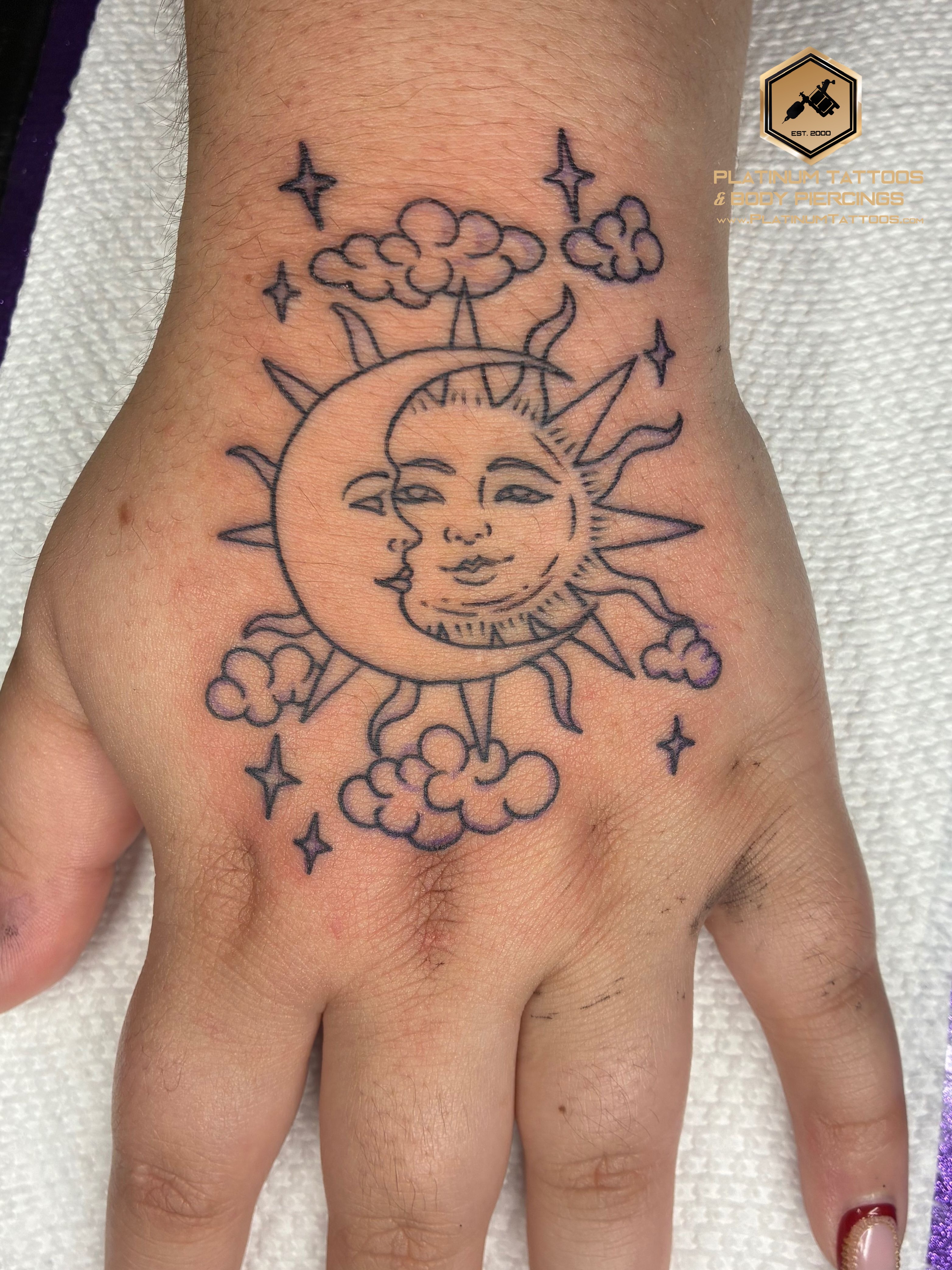 Blackwork Black Sun, Moon tattoo on the Hand by Jr at Platinum Tattoos & Piercings, San Antonio TX