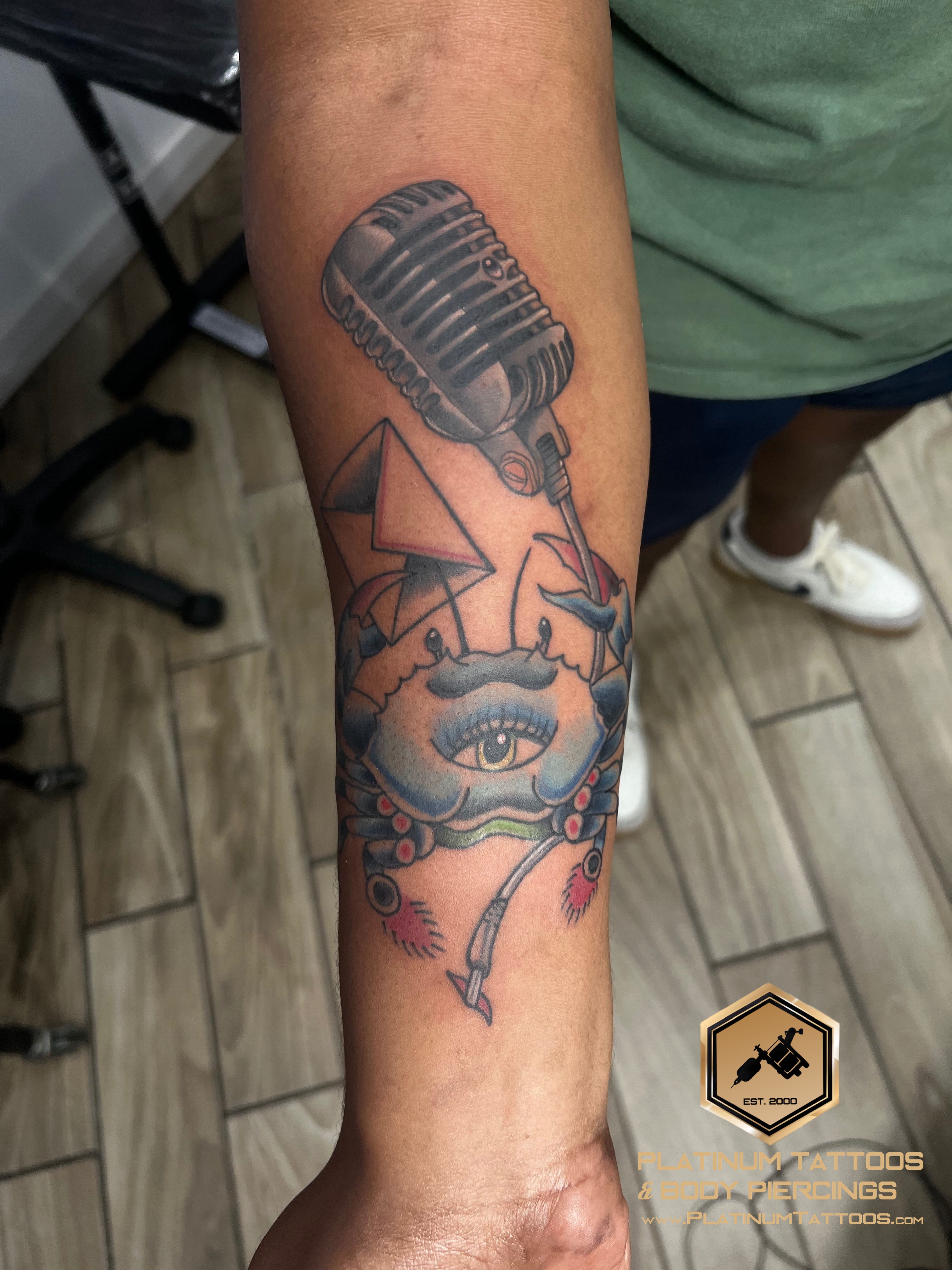 Traditional, Color Black, Blue, Red, Grey tattoo on the Forearm by Jesus at Platinum Tattoos & Piercings, San Antonio TX