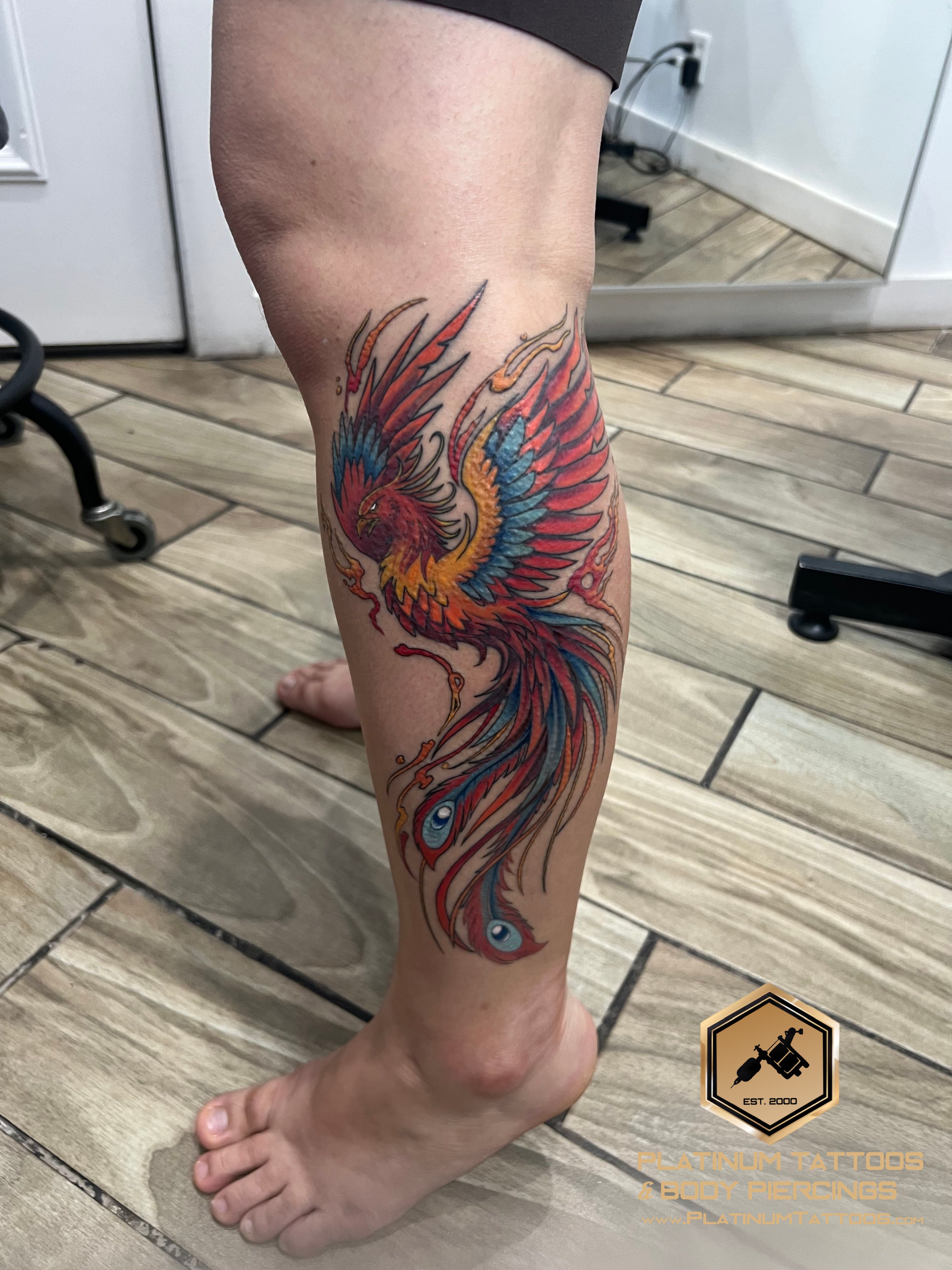 Color, Neo-Traditional, Traditional Phoenix tattoo on the Calf by Jesus at Platinum Tattoos & Piercings, San Antonio TX