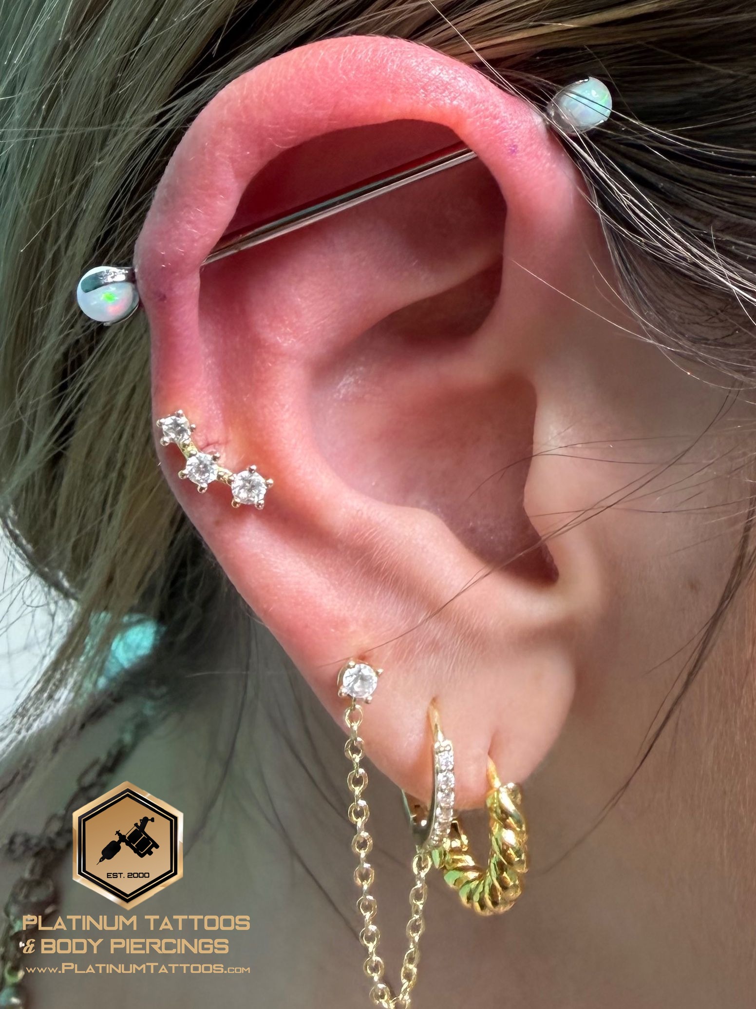Industrial piercing with Implant Grade Titanium Barbell by Industrial Strength by Mingo at Platinum Tattoos & Piercings, San Antonio TX