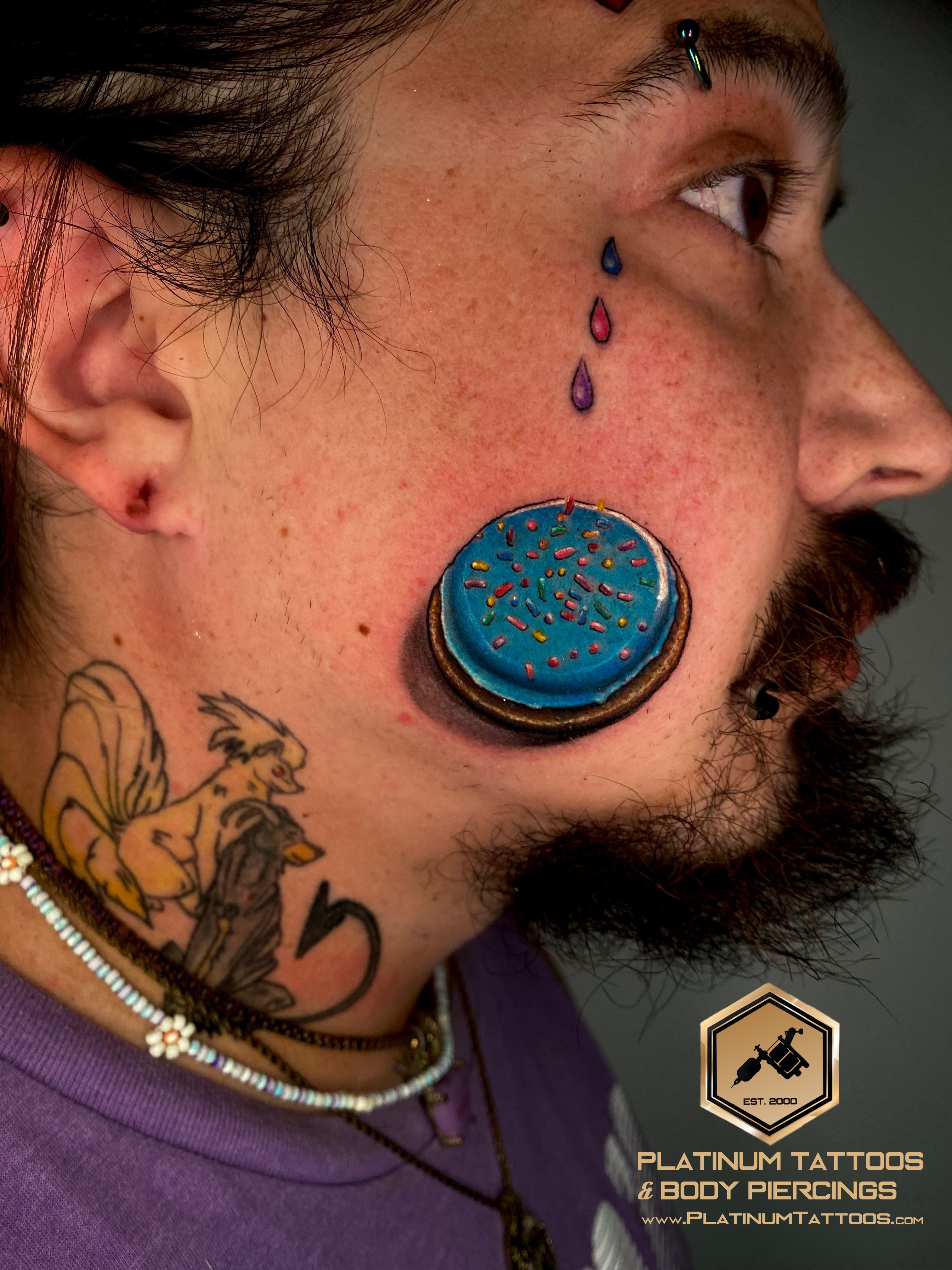 Color Multi-Color tattoo on the Face by Remy at Platinum Tattoos & Piercings, San Antonio TX