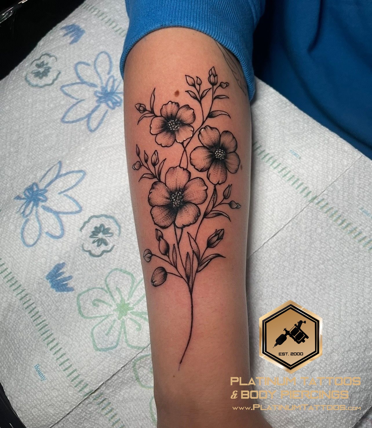 Black & Grey Flower tattoo on the Inner Forearm by Skar at Platinum Tattoos & Body Piercings, San Antonio TX