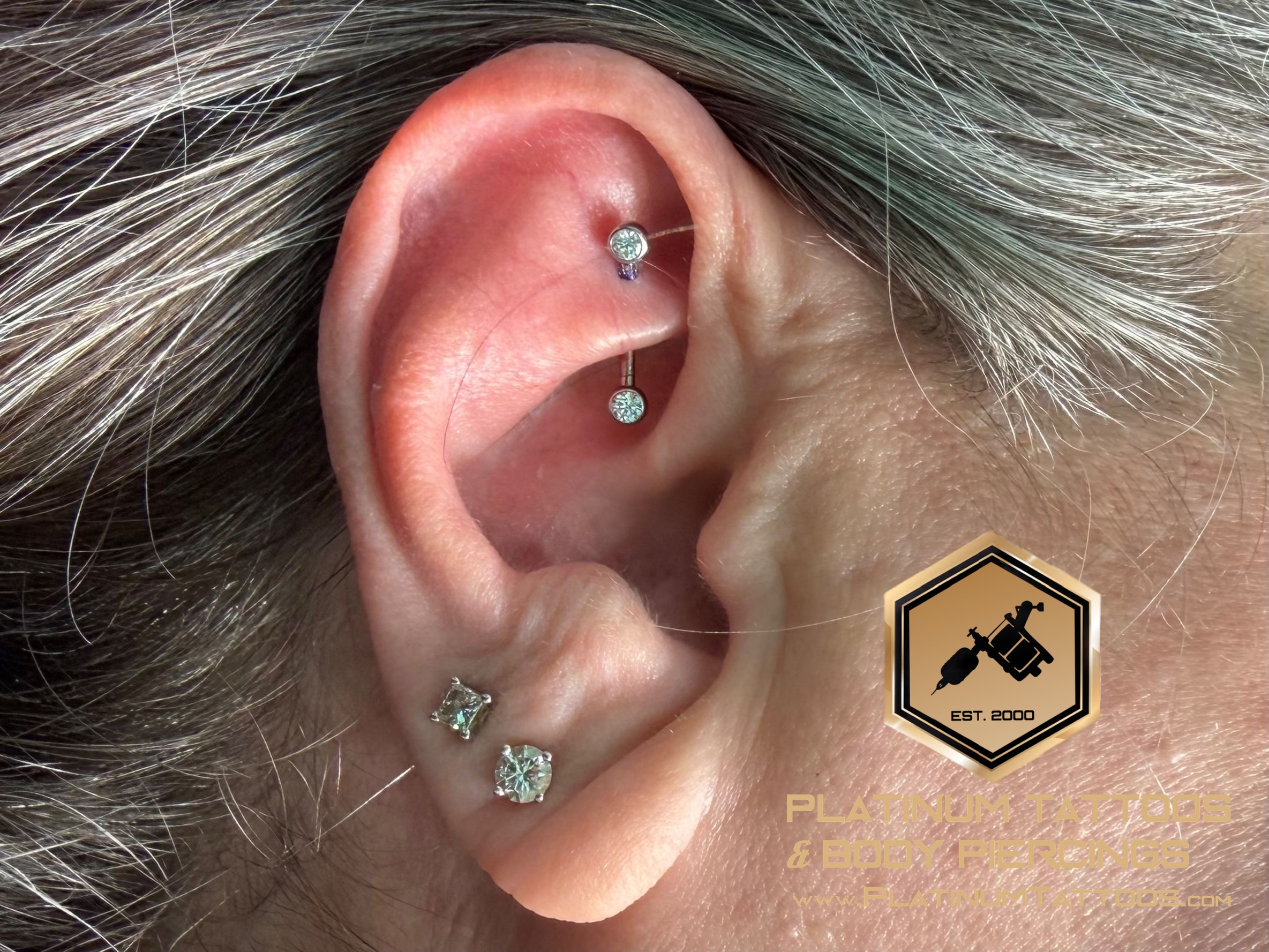 Rook piercing with Implant Grade Titanium Curved Barbell by NeoMetal by Mingo at Platinum Tattoos & Body Piercings, San Antonio TX