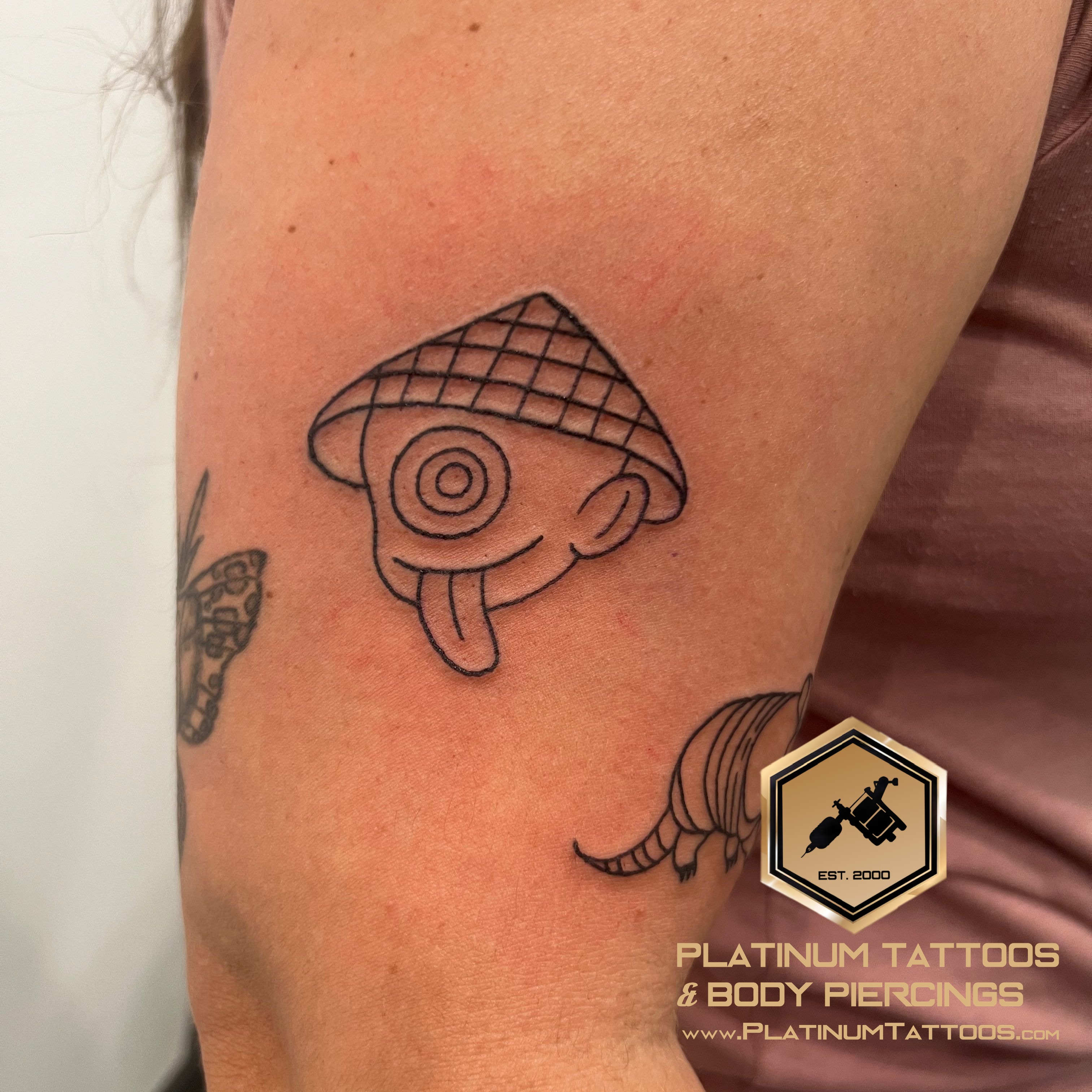 Sketch Black tattoo on the Outer Bicep by Jesus at Platinum Tattoos & Body Piercings, San Antonio TX