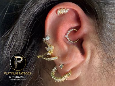 Daith piercing with Implant Grade Titanium Clicker by Other by Mingo at Platinum Tattoos & Piercings, San Antonio TX