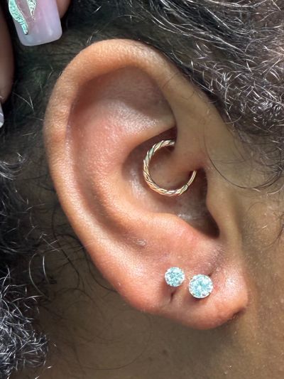 Curated ear piercing setup — 1st Lobe, 2nd Lobe, Daith with Implant Grade Titanium, 14k Yellow Gold Threadless, Seamless Ring by NeoMetal, Other by Mingo at Platinum Tattoos & Piercings, San Antonio TX