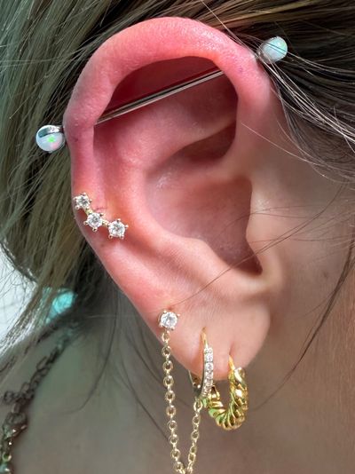Industrial piercing with Implant Grade Titanium Barbell by Industrial Strength by Mingo at Platinum Tattoos & Piercings, San Antonio TX