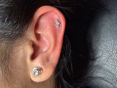 1st Helix piercing with Implant Grade Titanium Cluster/Multi-Gem by NeoMetal by Mingo at Platinum Tattoos & Piercings, San Antonio TX