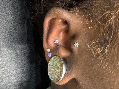 Conch piercing with Implant Grade Titanium Cluster/Multi-Gem by NeoMetal by Mingo at Platinum Tattoos & Piercings, San Antonio TX